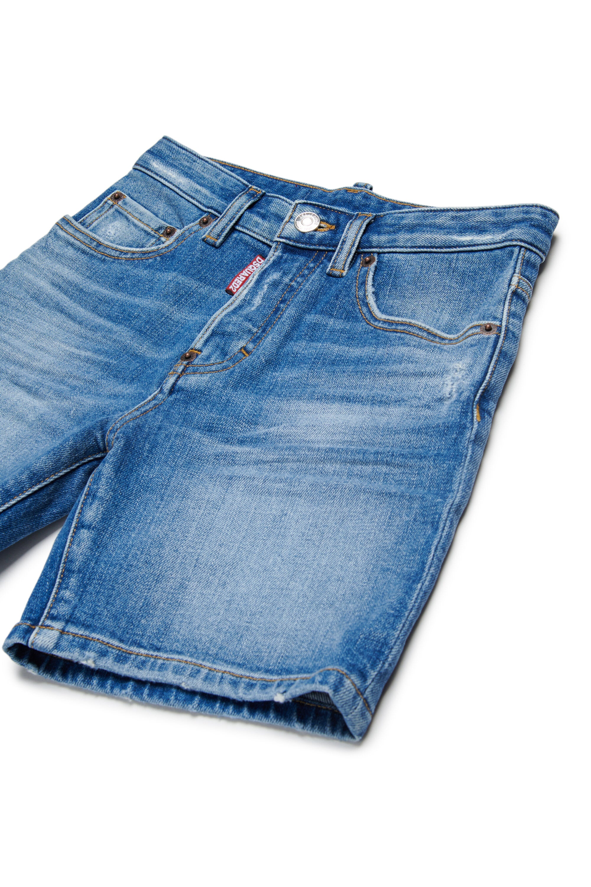 Medium blue denim shorts with abrasions
