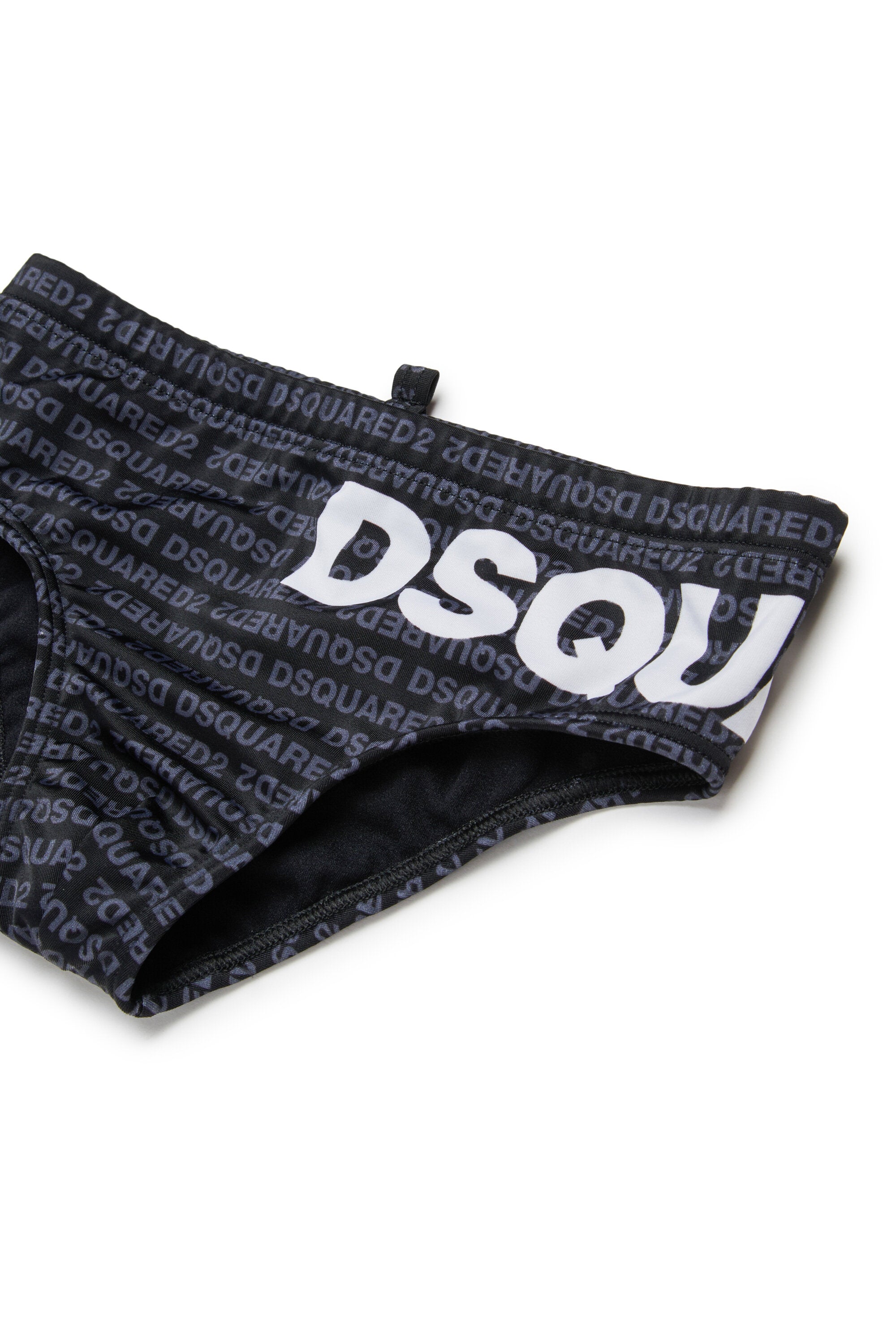 Bañador slip con logo por todas partes