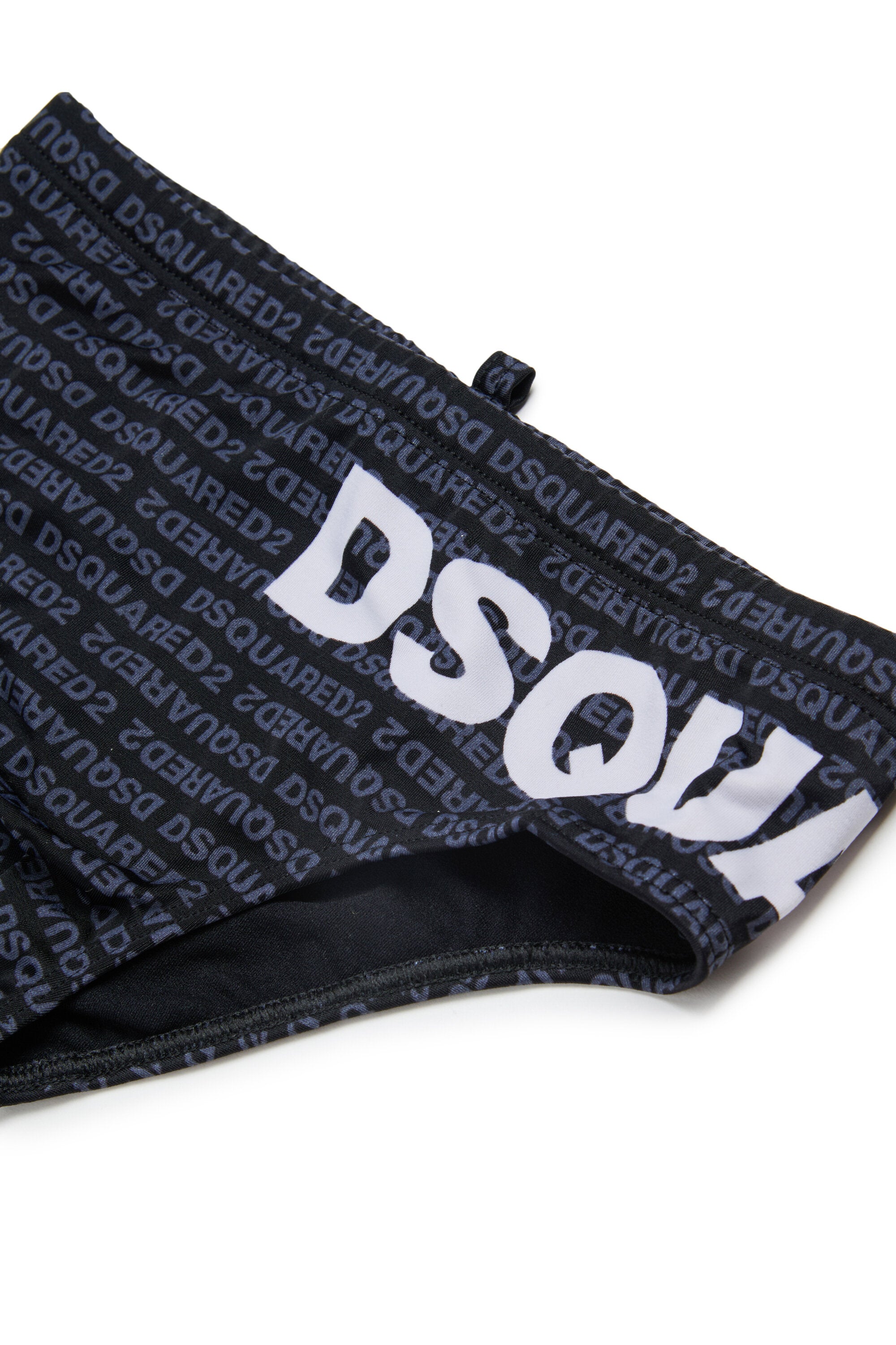 Bañador slip con logo por todas partes