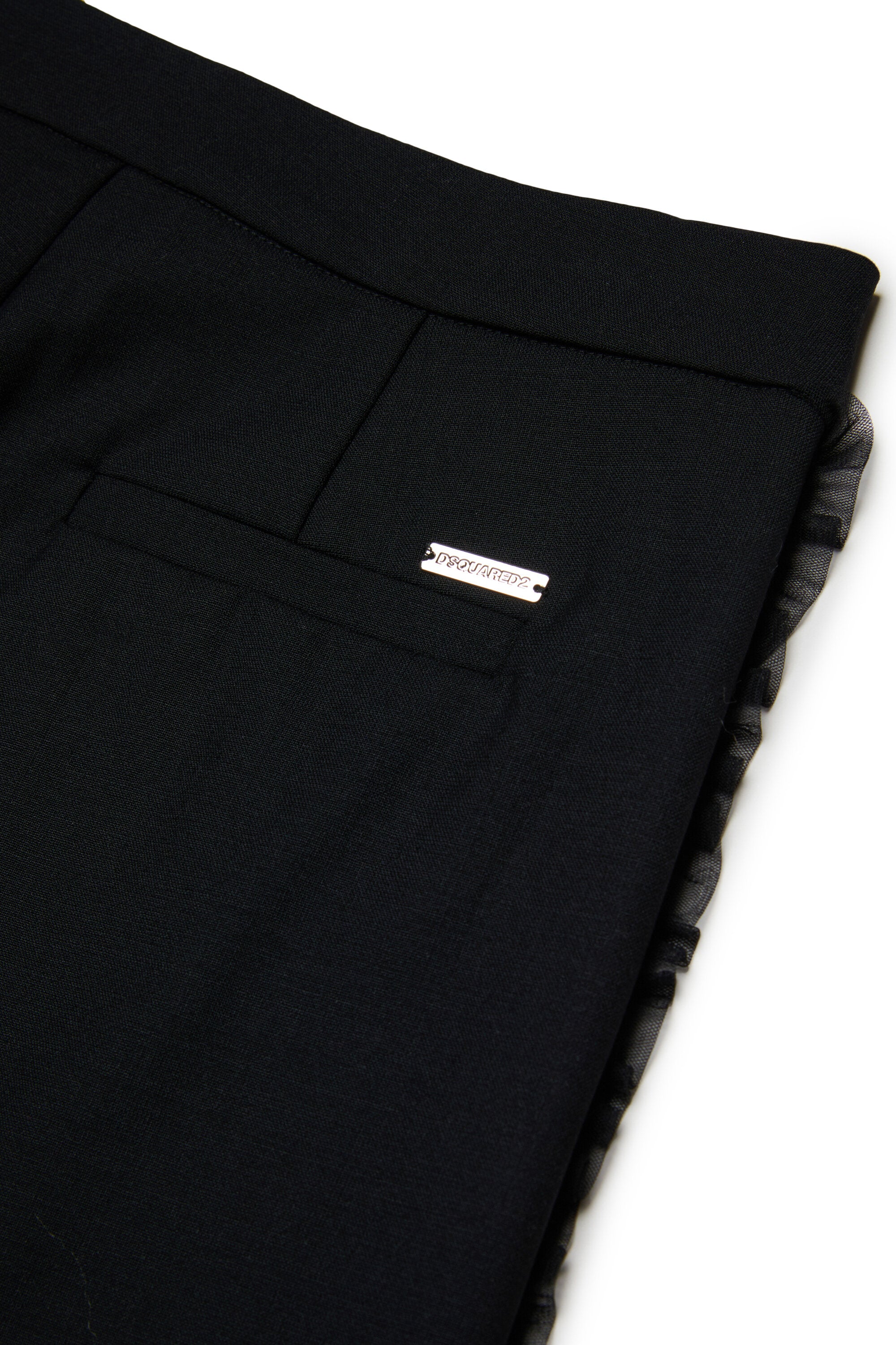 Pantalones formales con detalles plisados