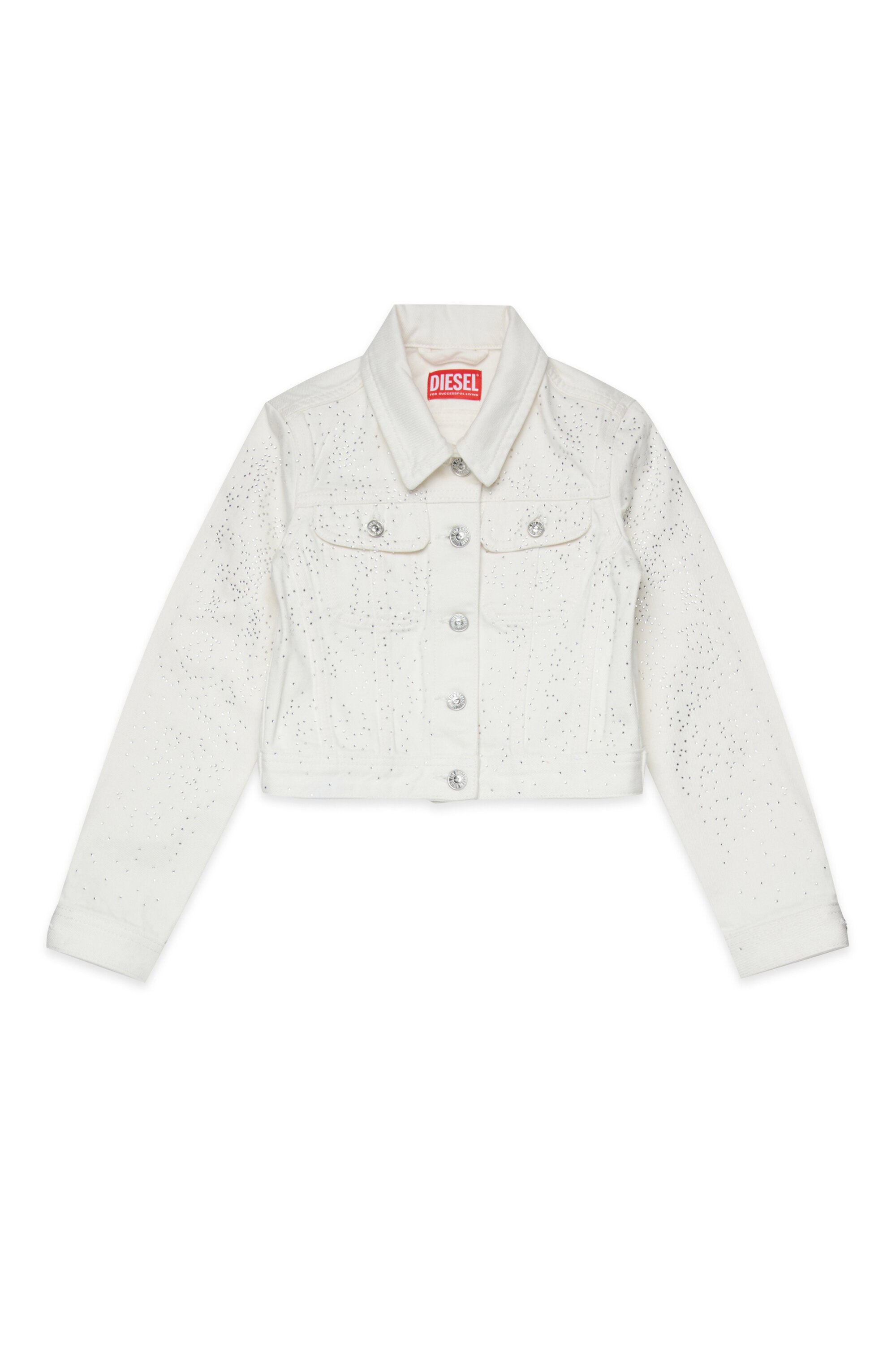 Chaqueta vaquera con microtachuelas por toda la prenda