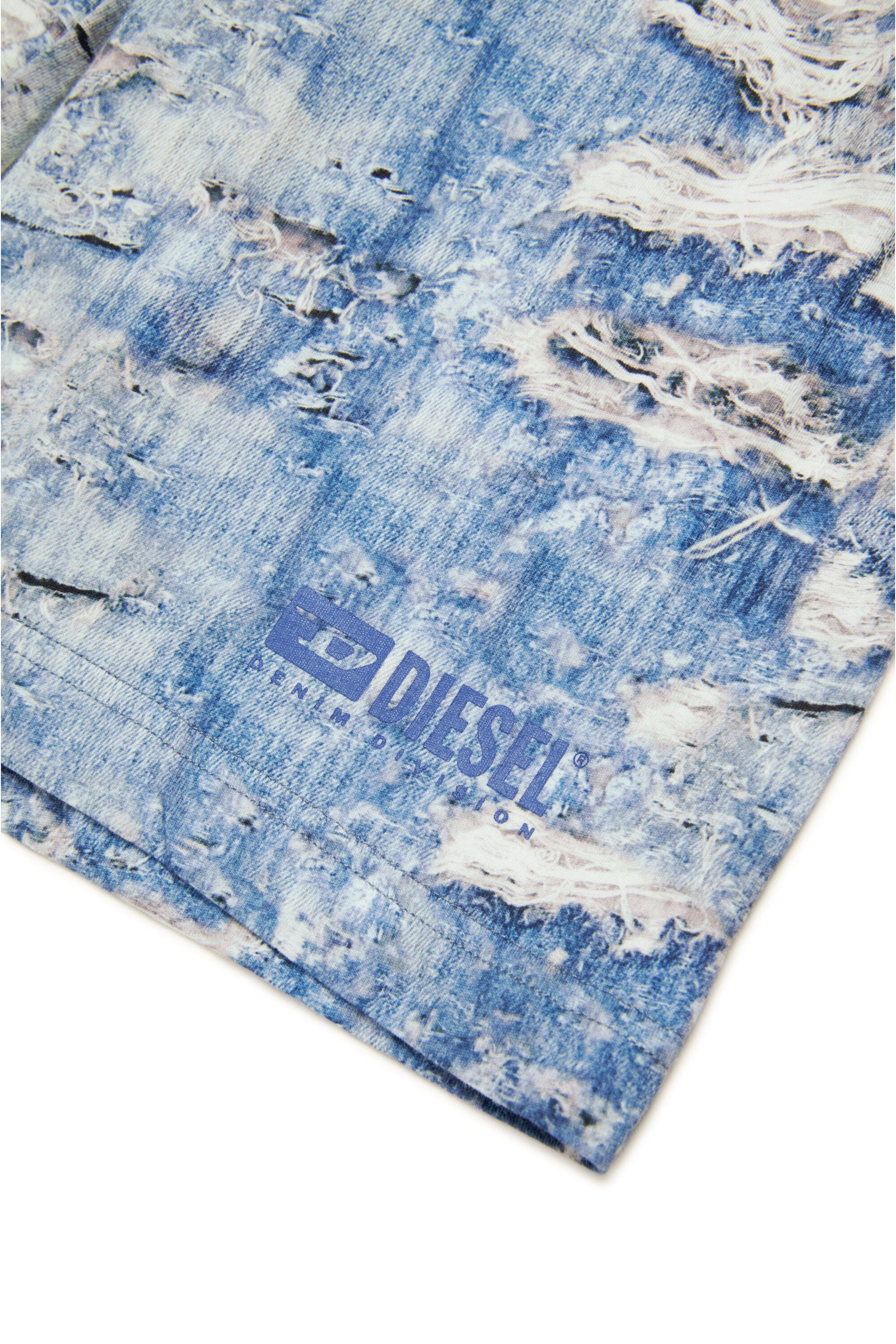 Pantalones cortos con estampado efecto denim rasgado