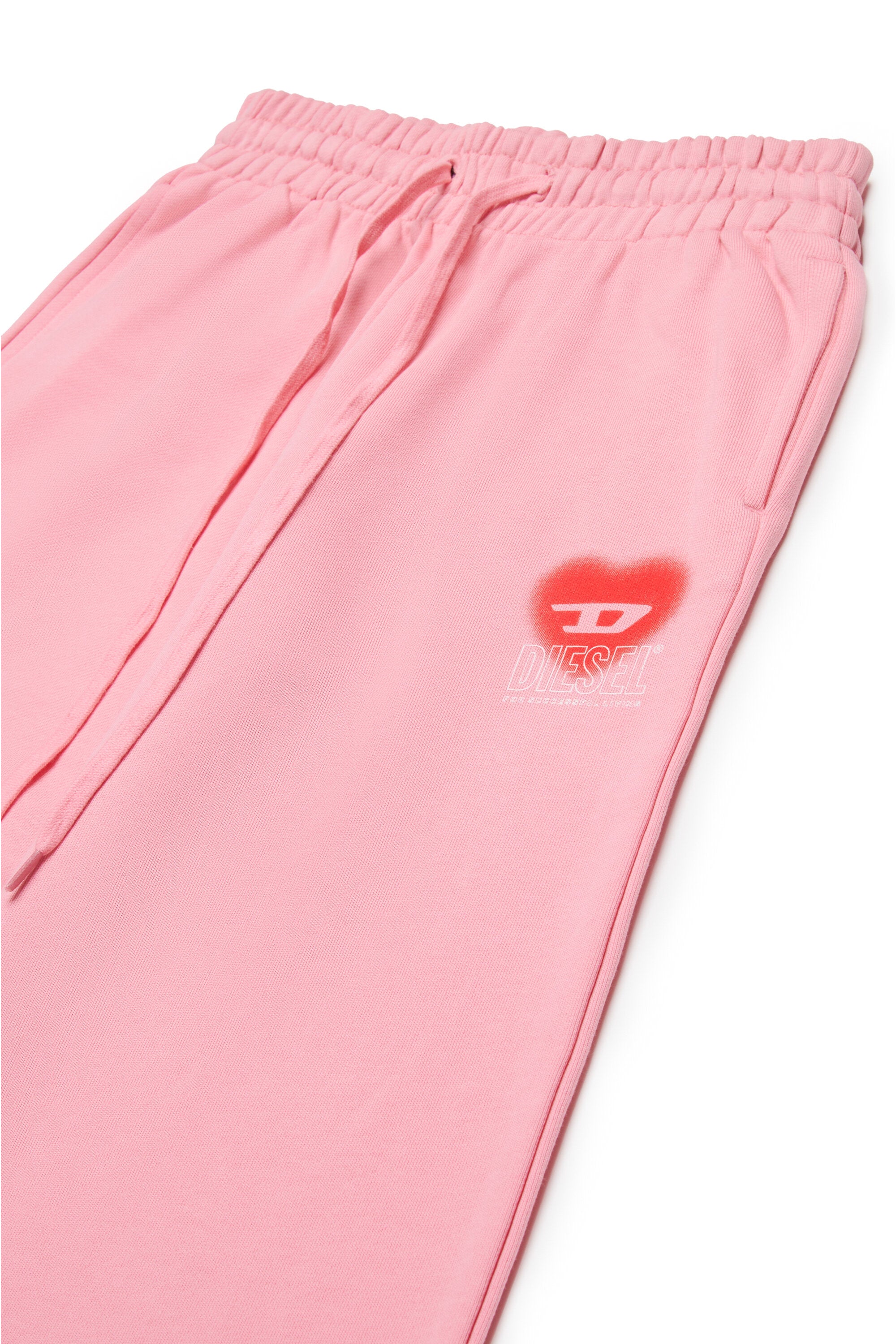 Fleece pants with heart graphics