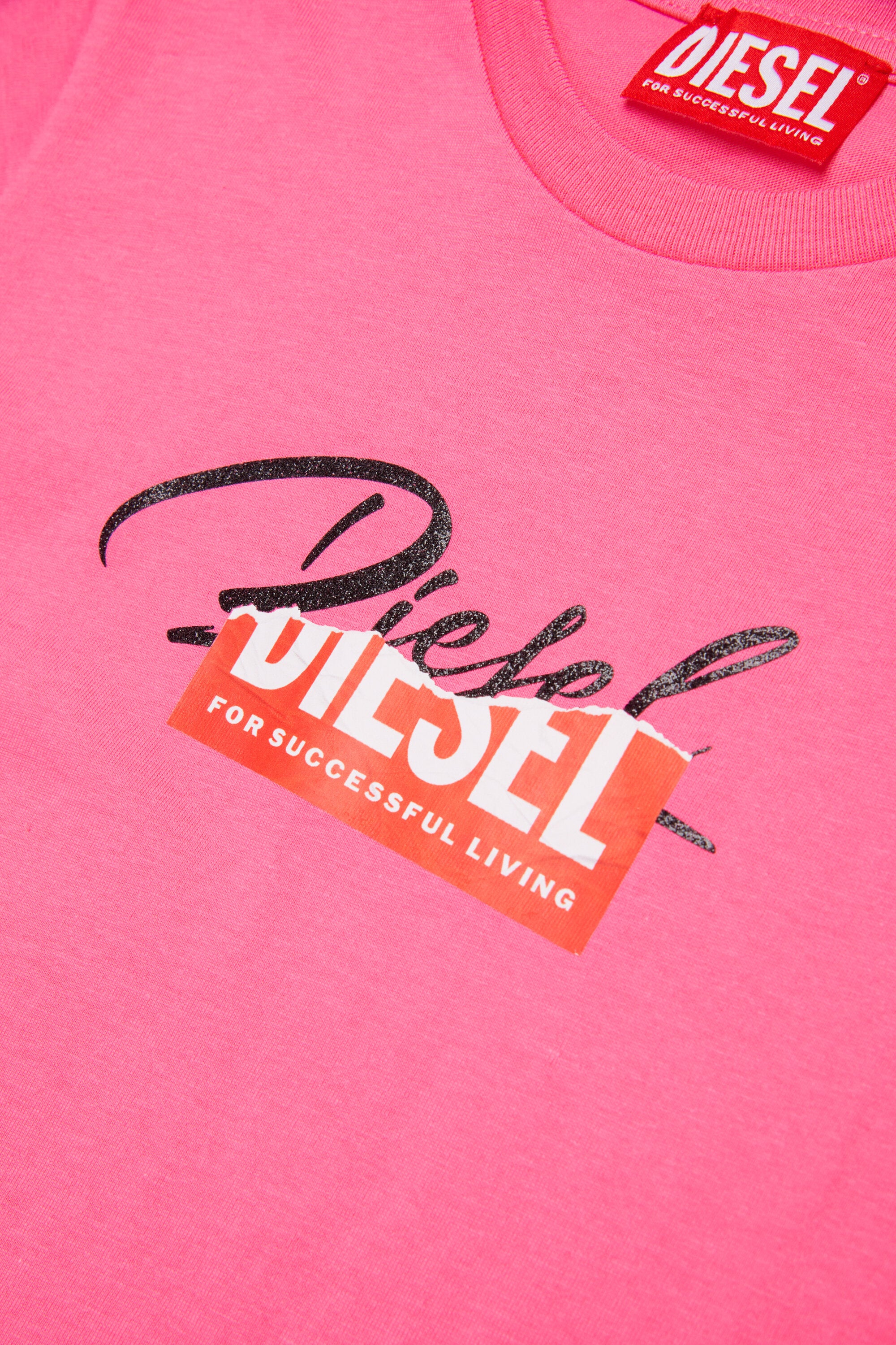 Camiseta de punto con logo superpuesto