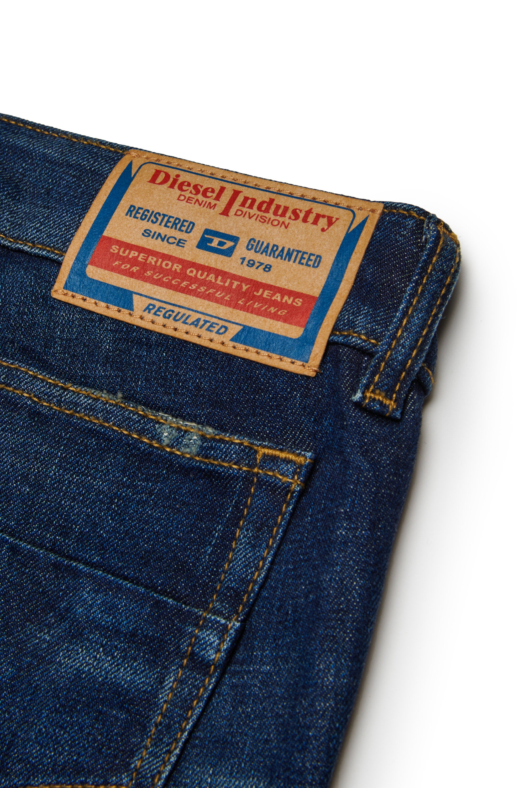 Vaqueros bootcut azul oscuro con abrasiones - D-Eki