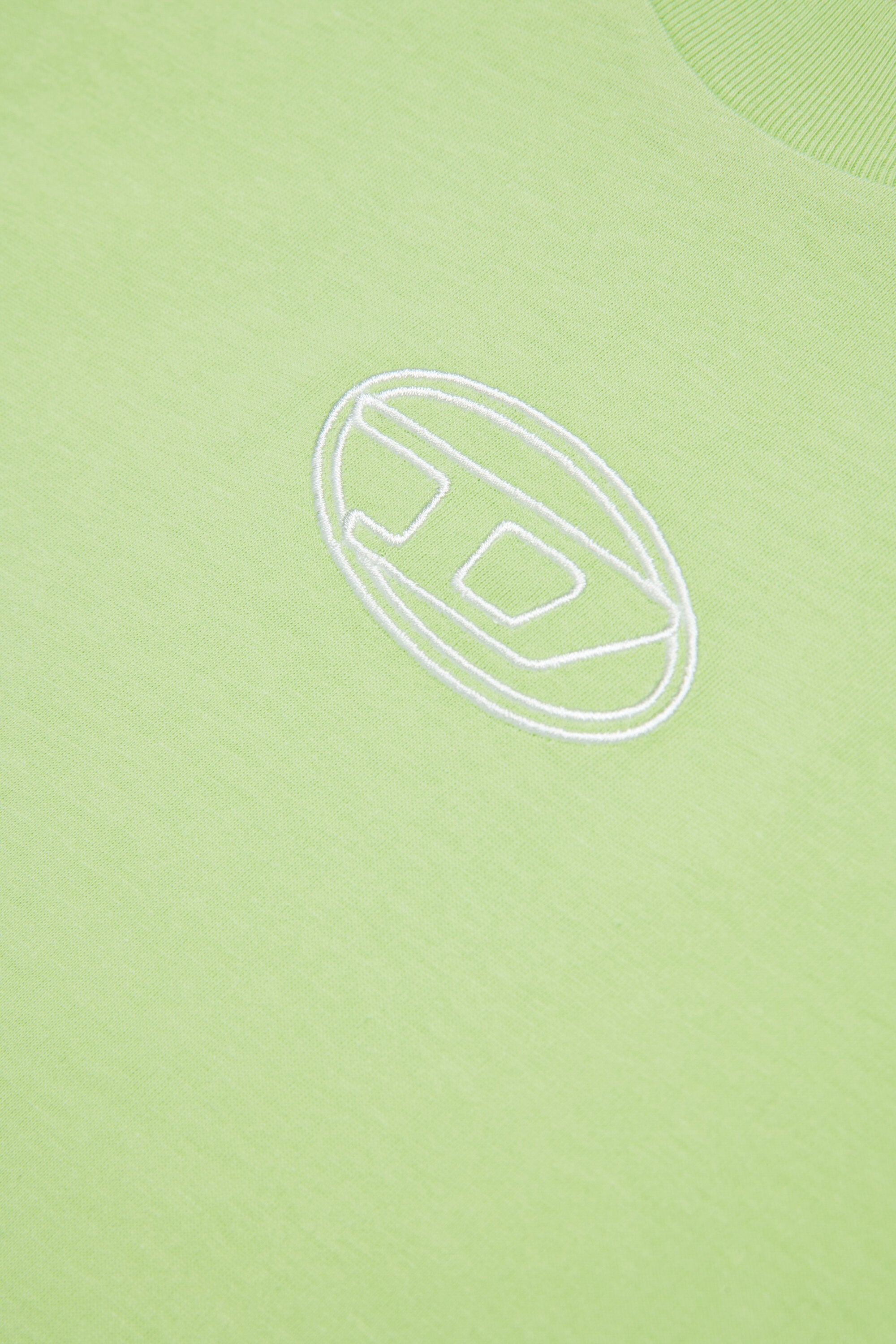 Camiseta boxy de punto con el logotipo de la Oval D