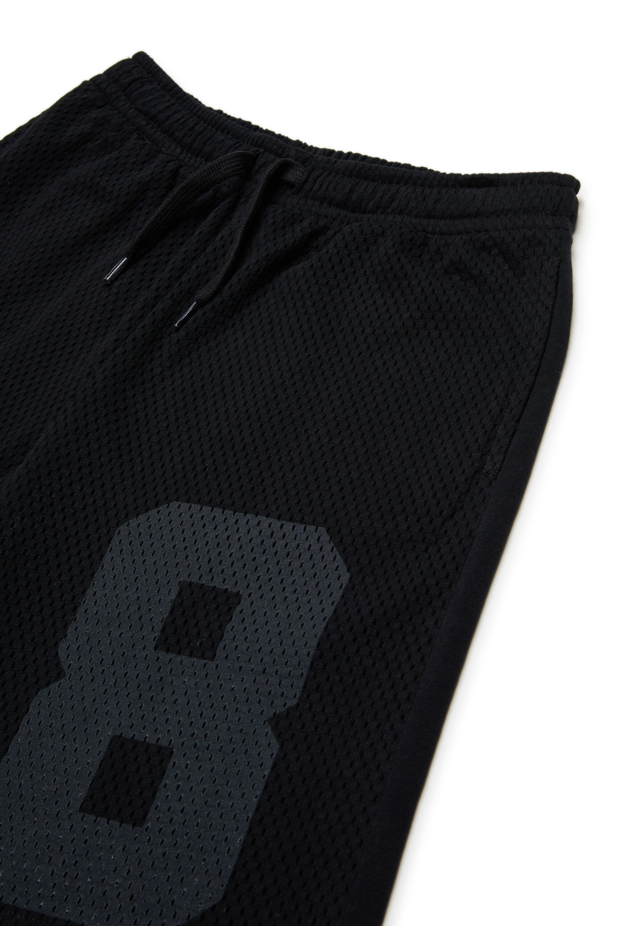 Shorts de felpa con números frontales