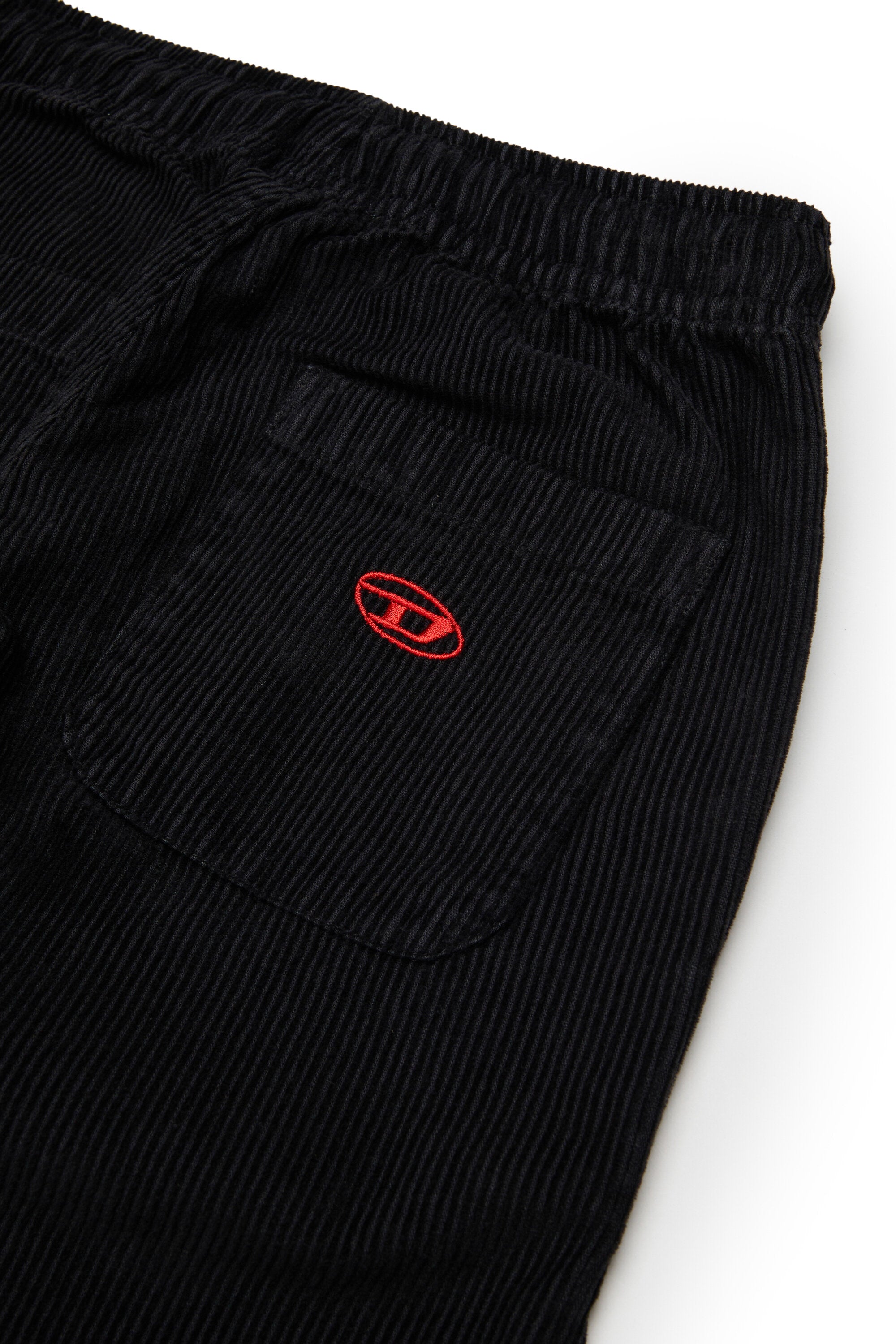Pantalones de pana con logo
