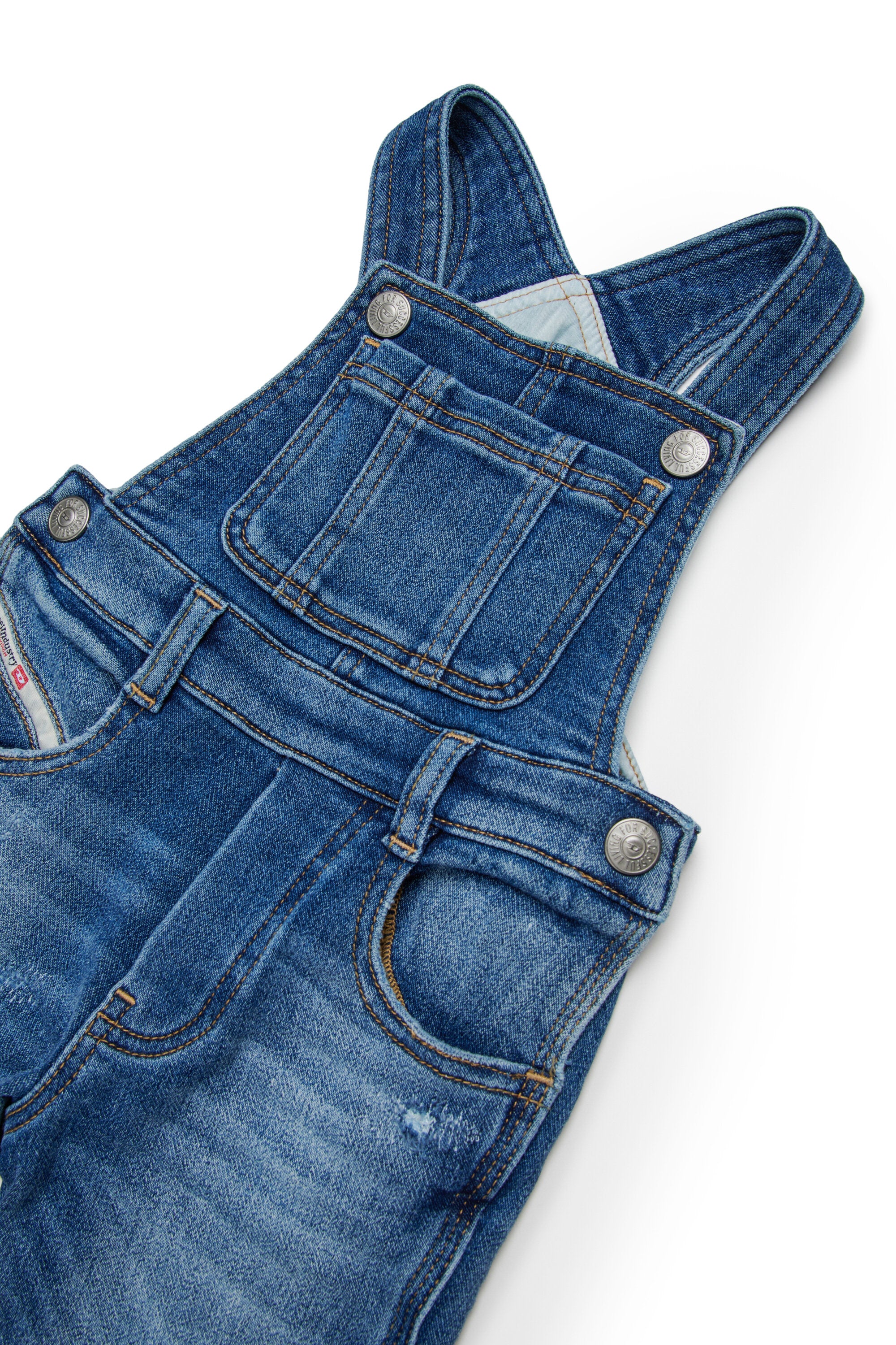 Mono largo JoggJeans® azul medio con abrasiones