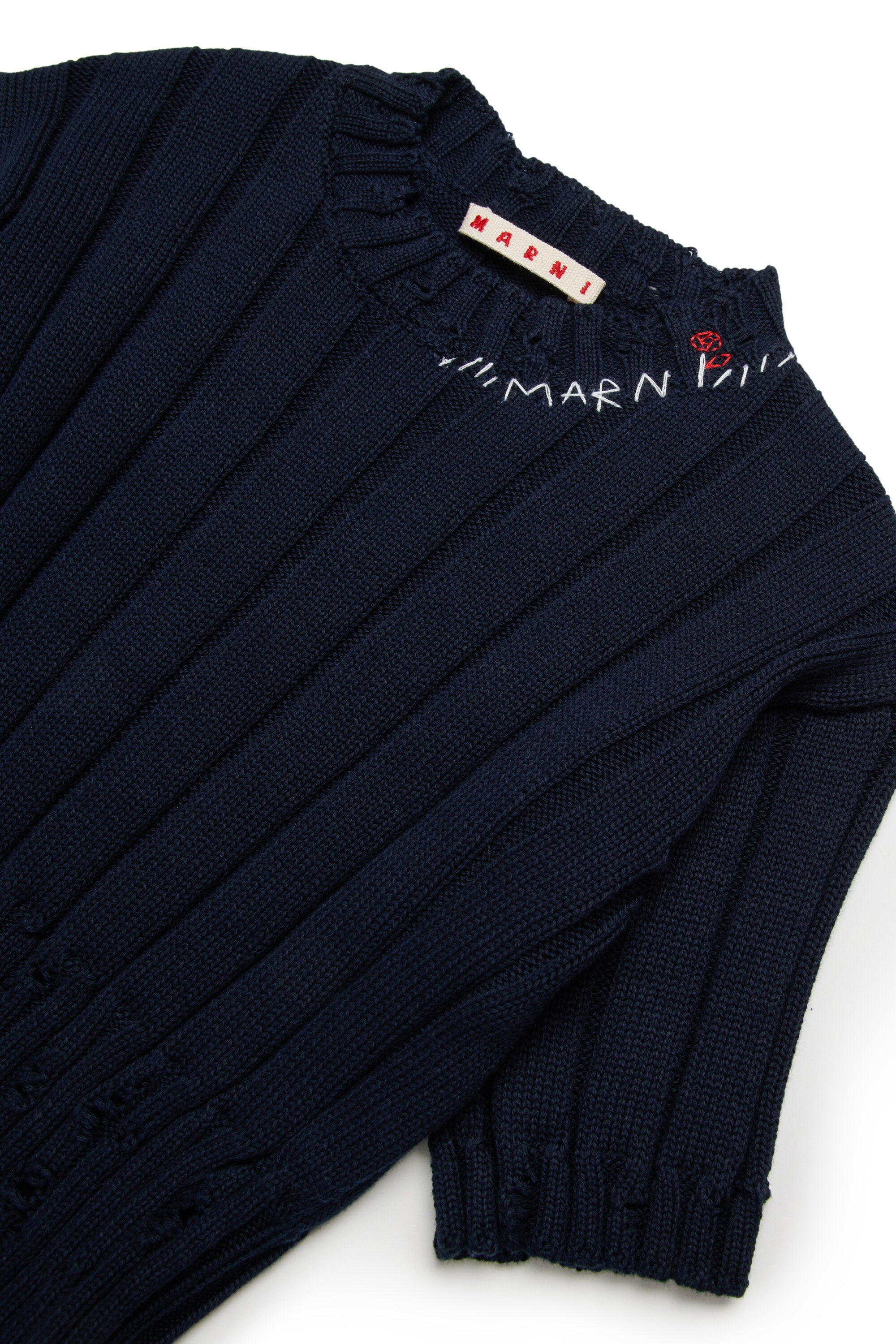 Tops de canalé con rotos