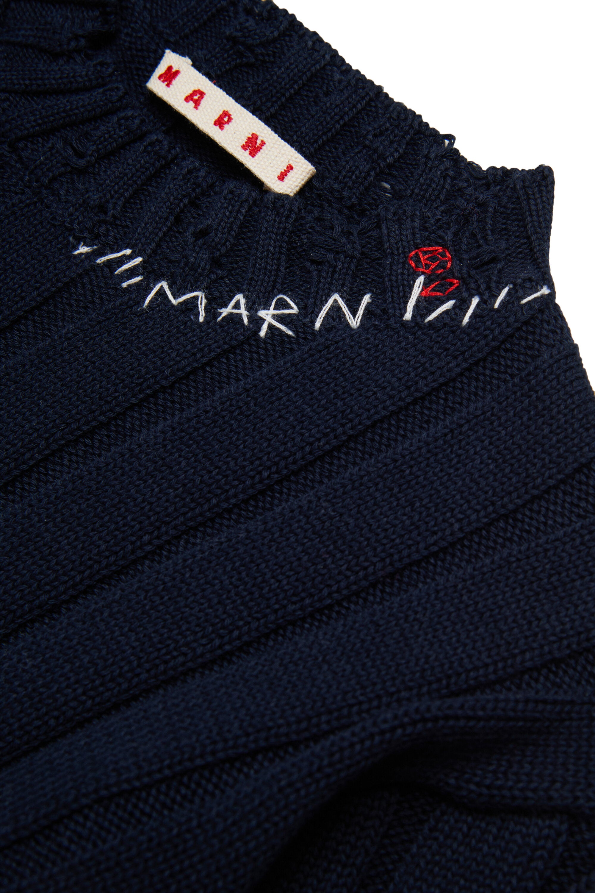 Ribbed tops with rips