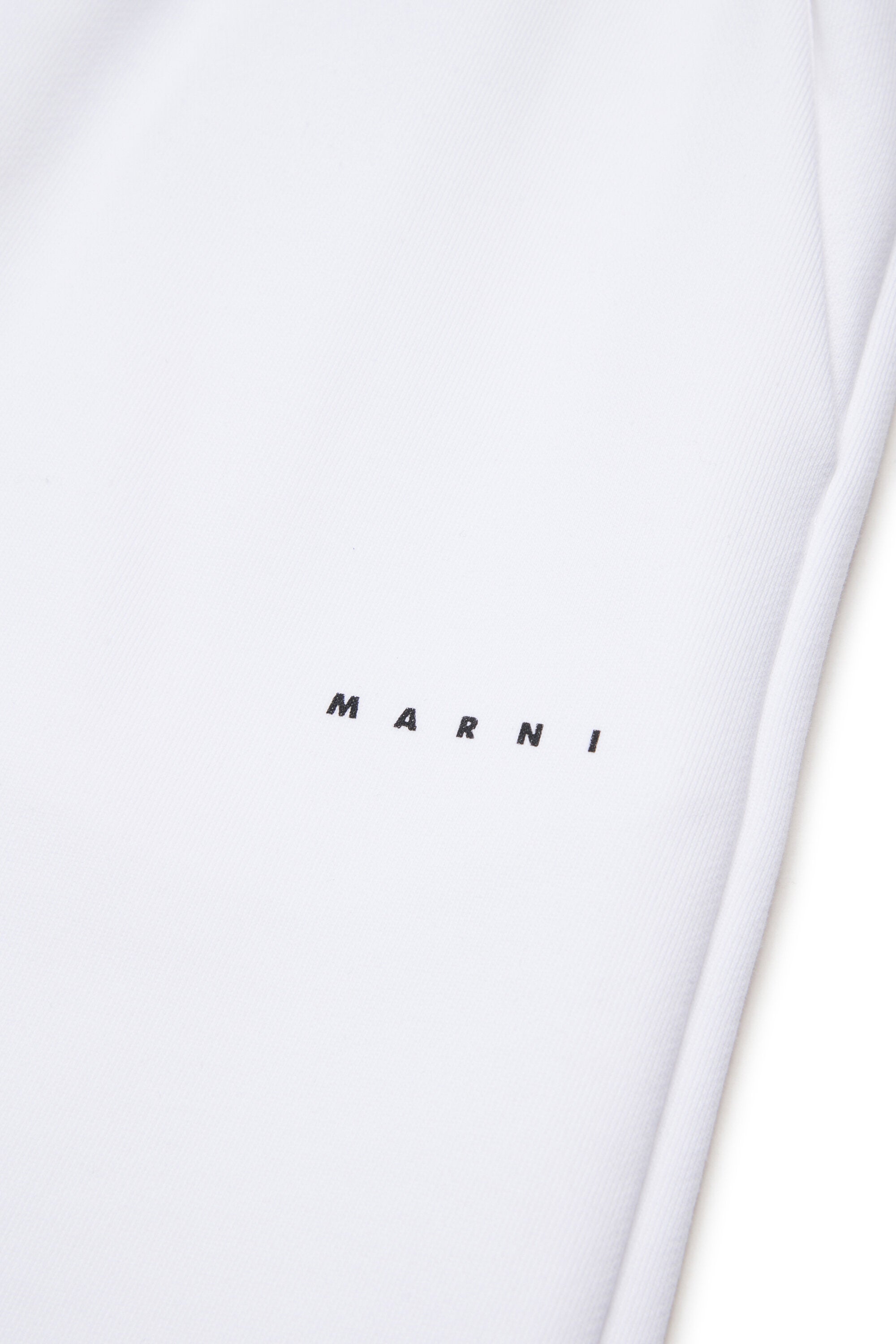 Pantalones con pernera ancha de felpa de marca