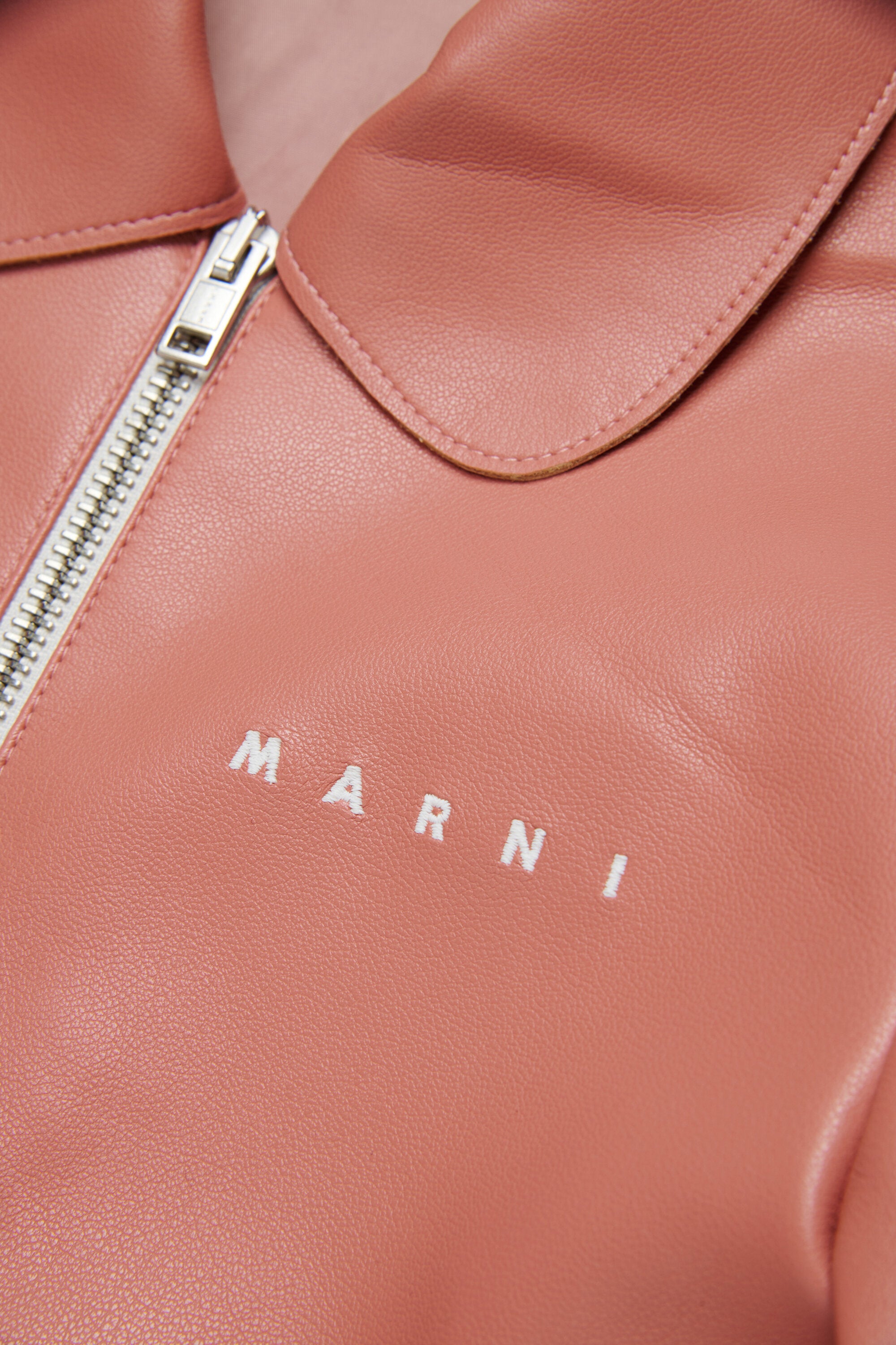 Chaqueta de tejido revestido con logotipo