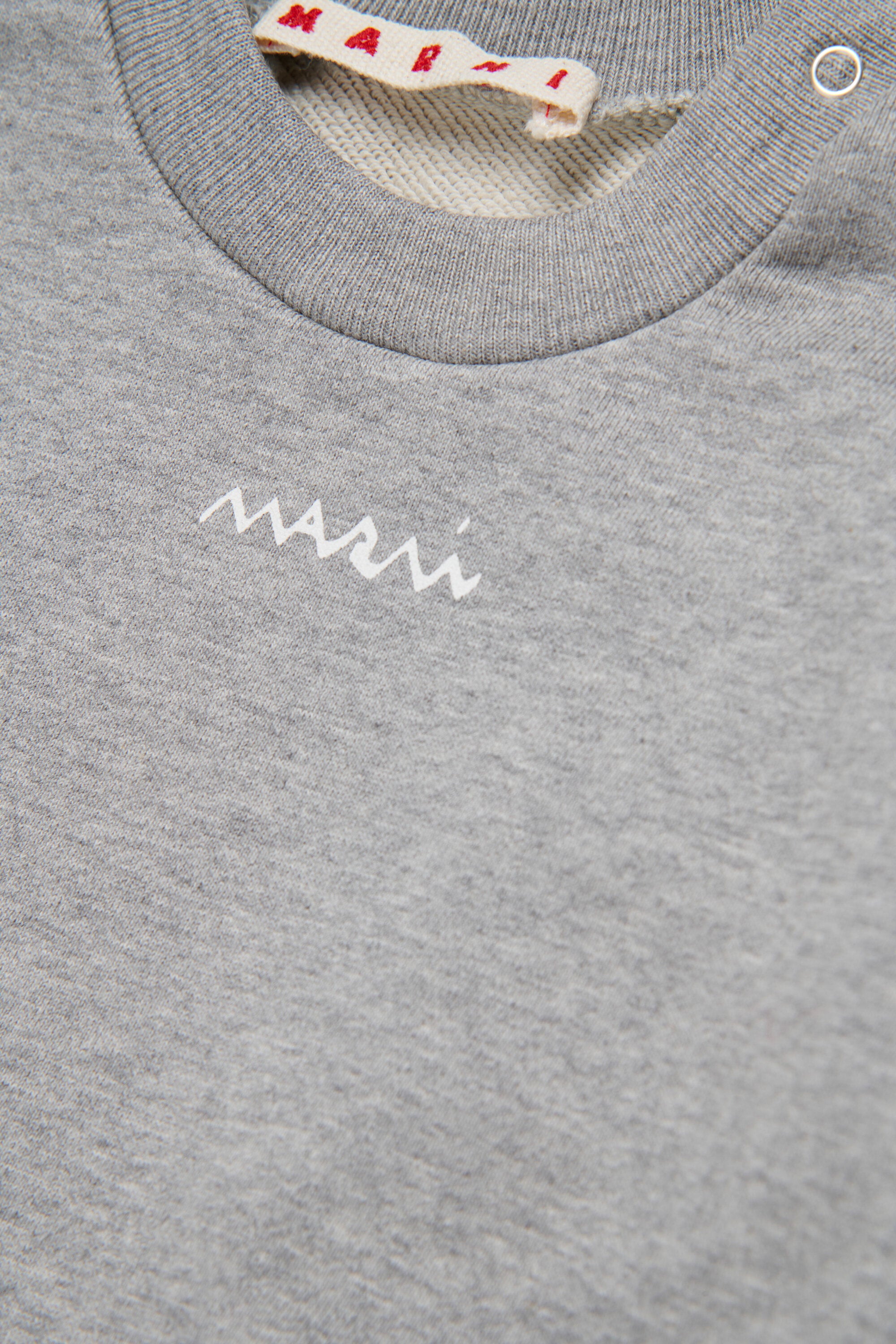 Sudadera de cuello redondo con volantes en el bajo