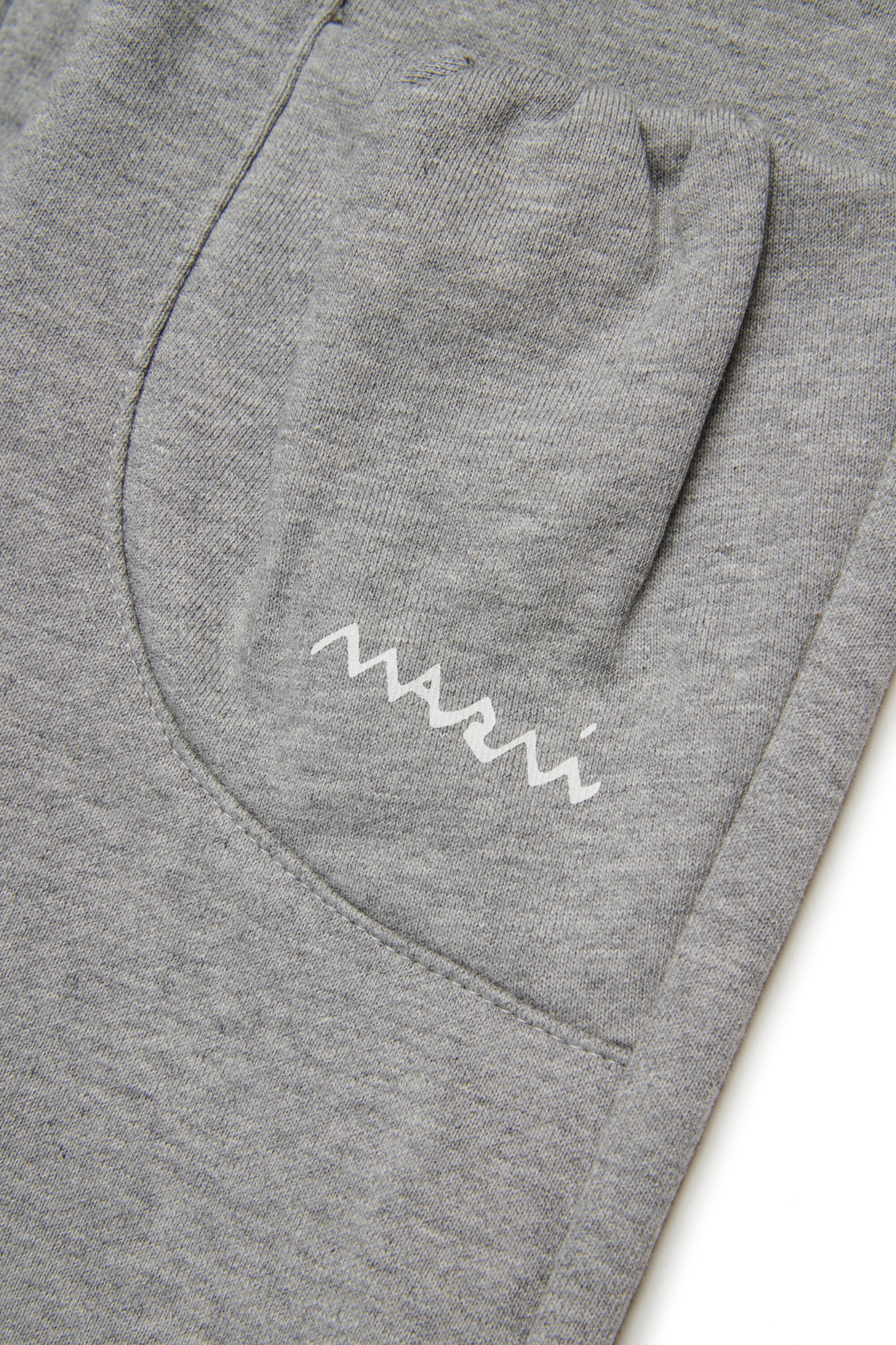 Pantalones deportivos de felpa con bolsillos fruncidos