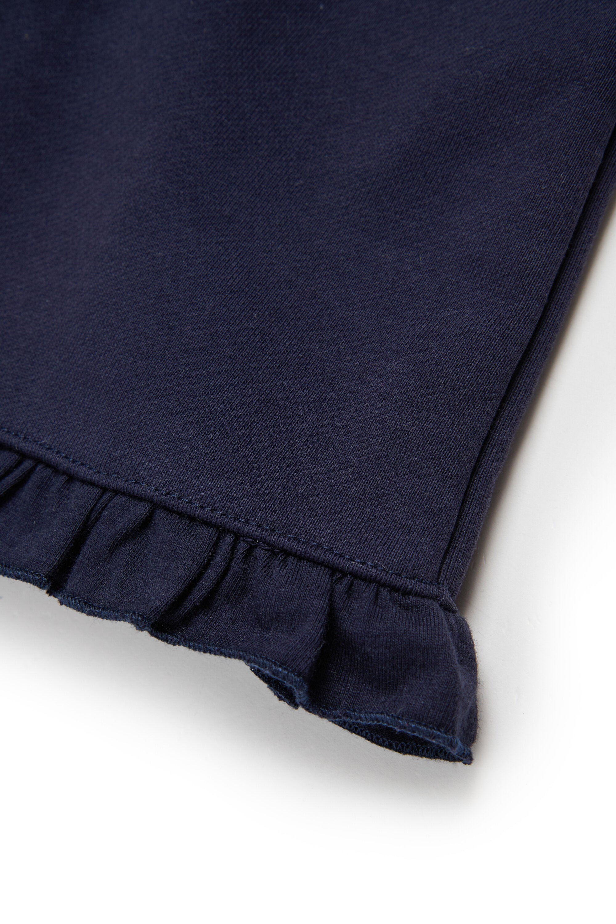 Peto sudadera con rouches en los bajos