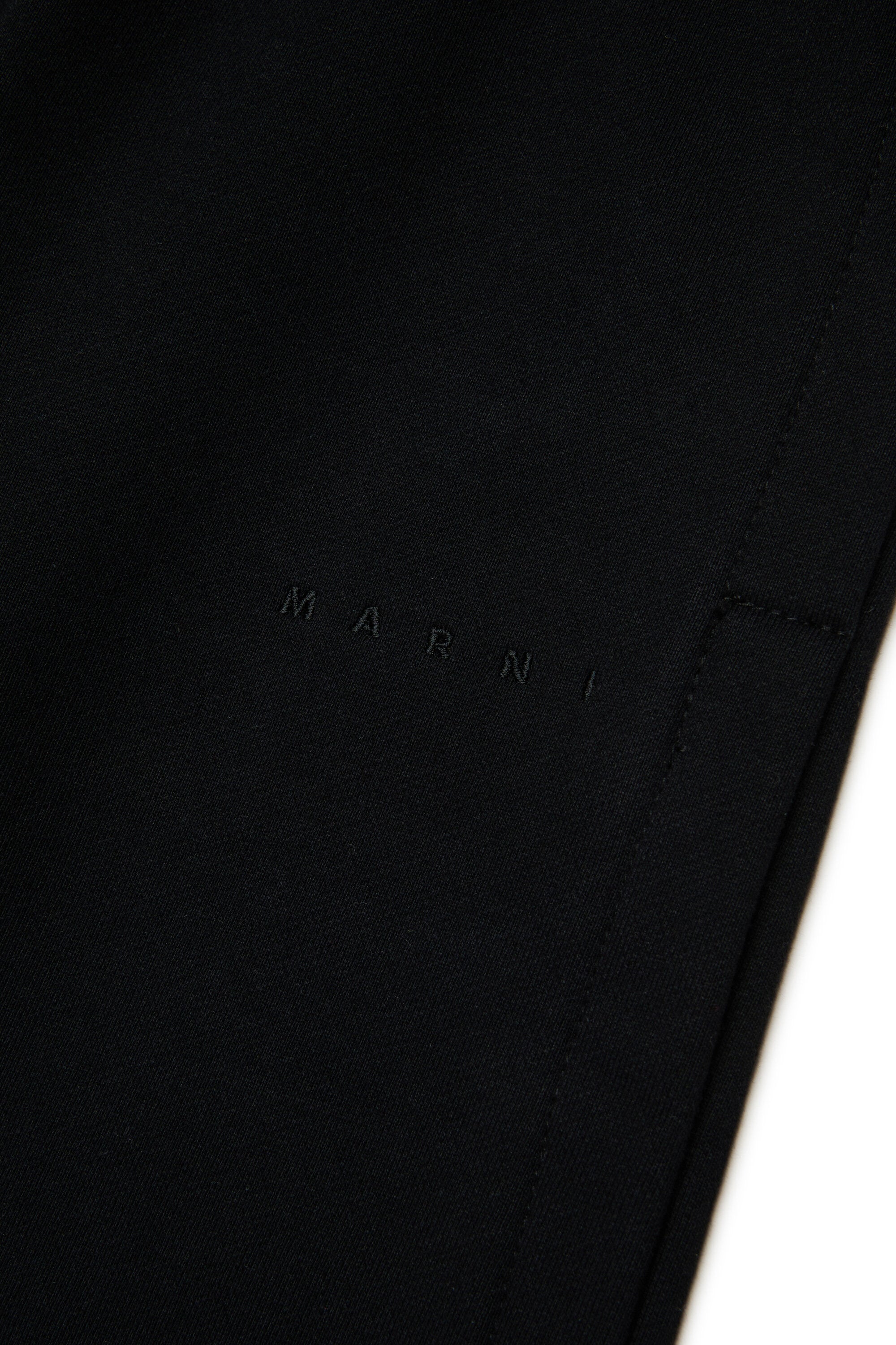 Pantalones sudadera con abertura lateral