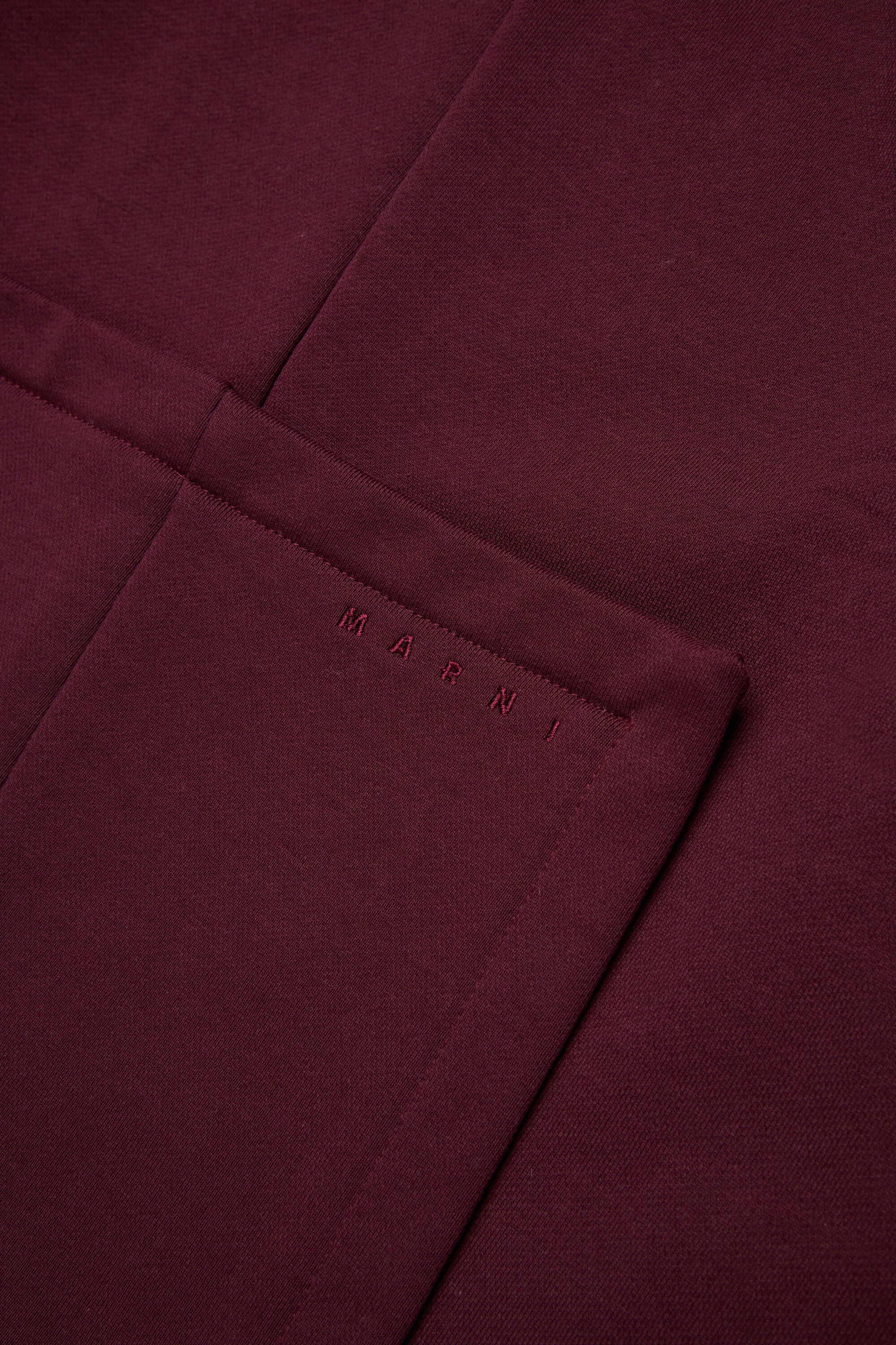 Sudadera de cuello redondo con bolsillos de parche