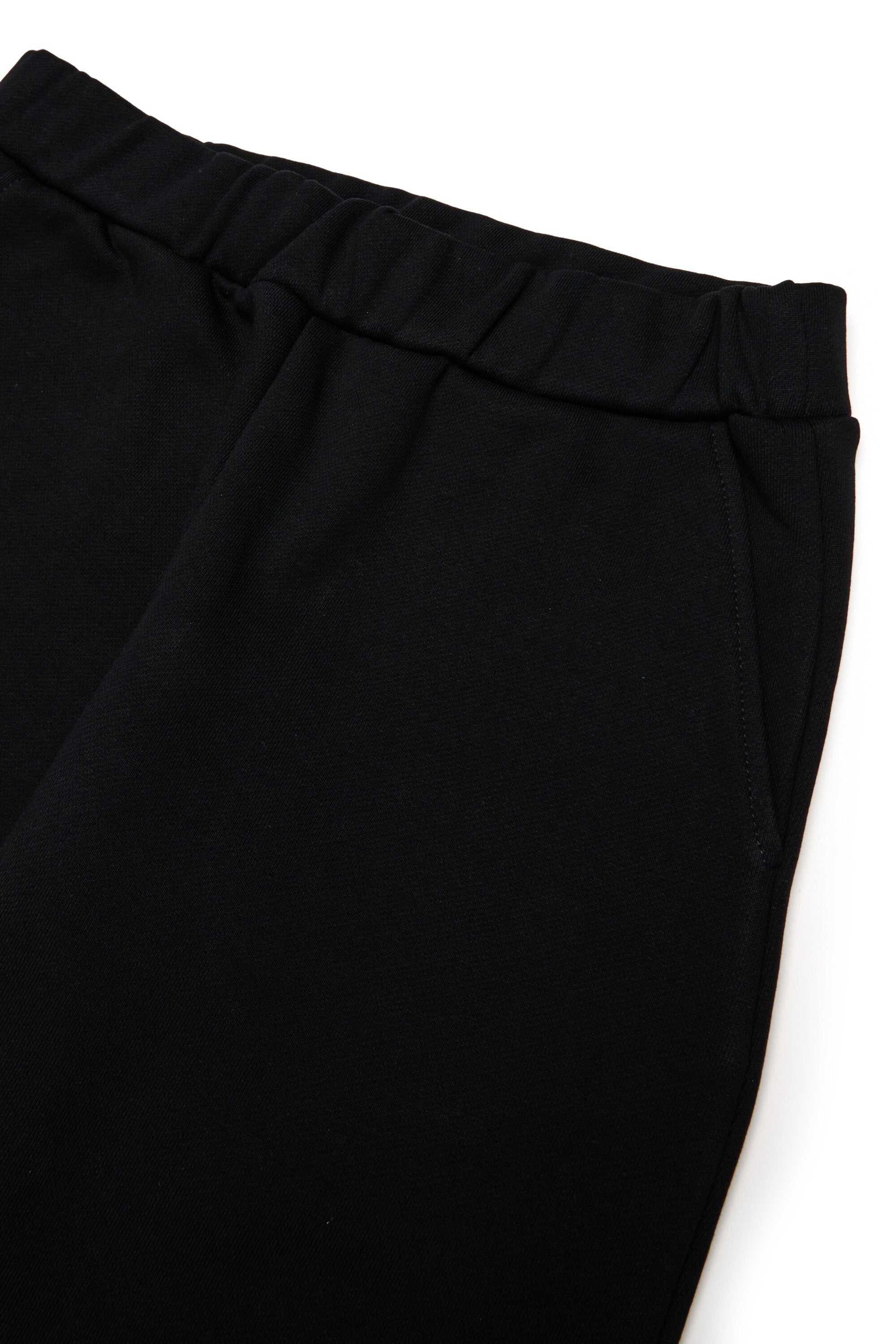 Pantalones deportivos de felpa con puños elásticos en los tobillos