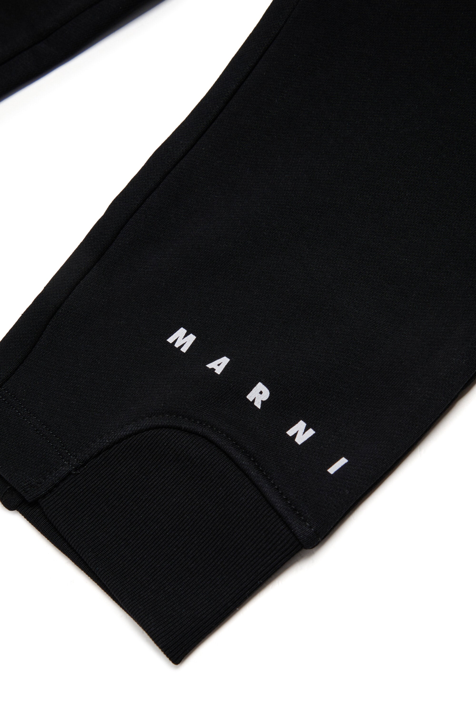 Pantalones deportivos de felpa con puños elásticos en los tobillos