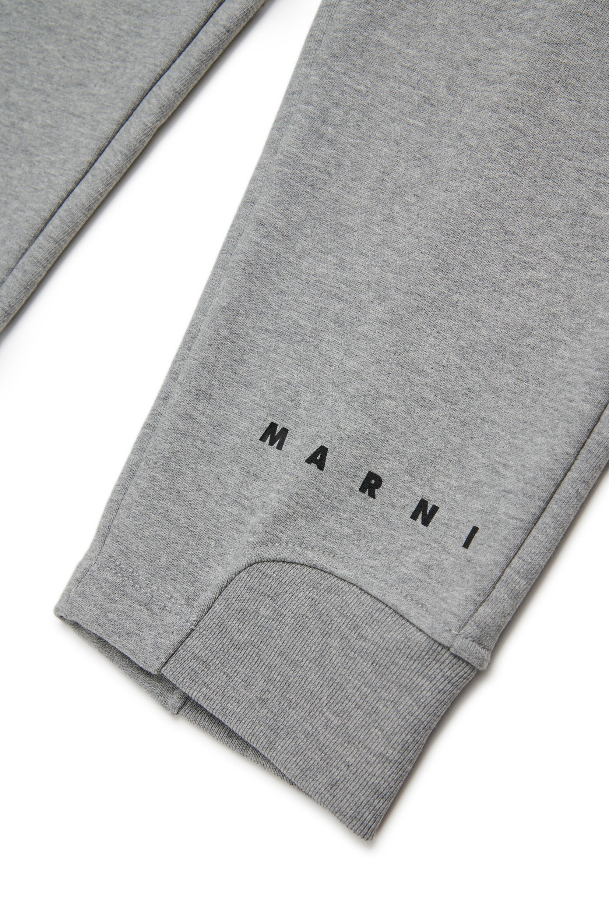 Pantalones deportivos de felpa con puños elásticos en los tobillos