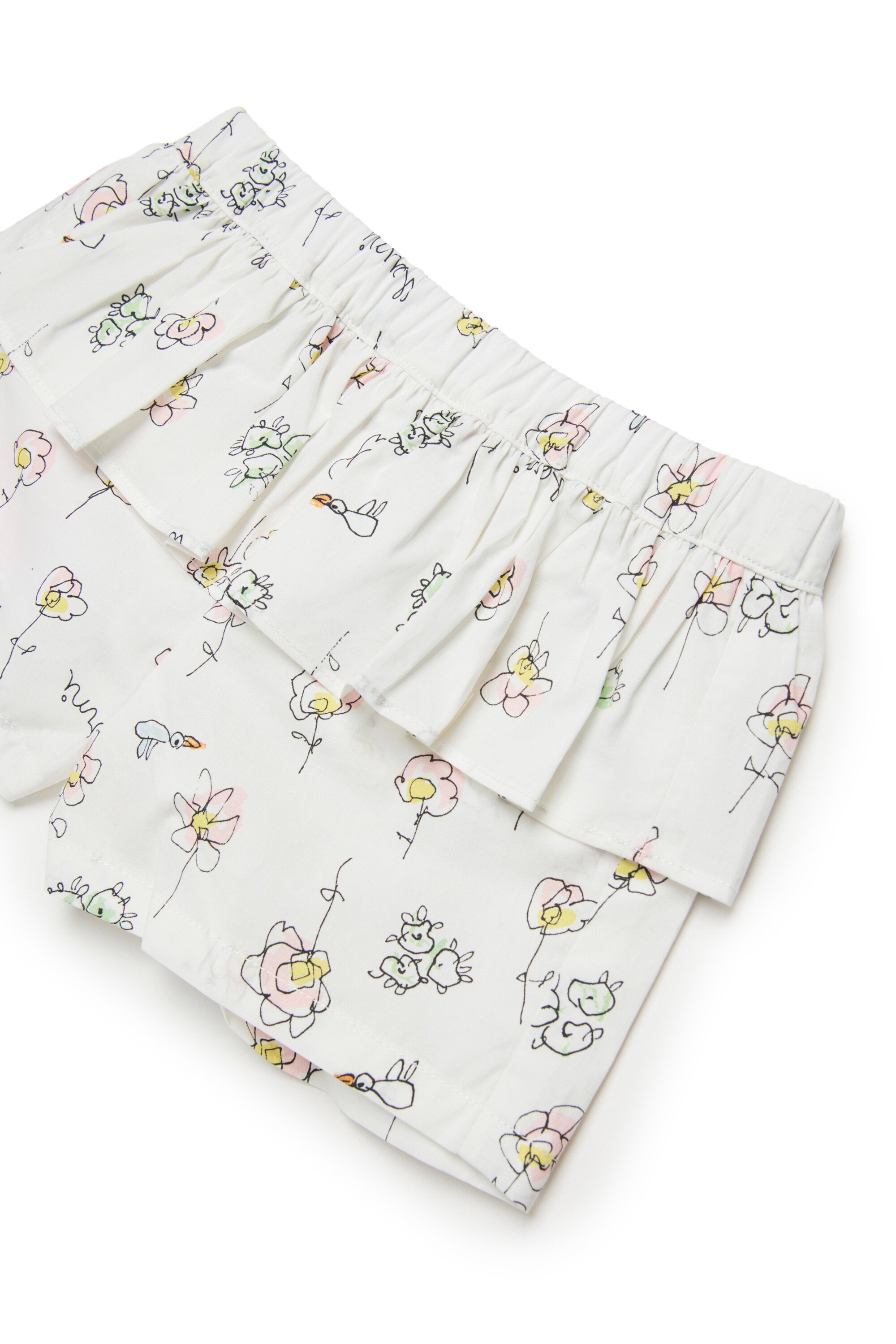 Shorts con volante y estampado de flores