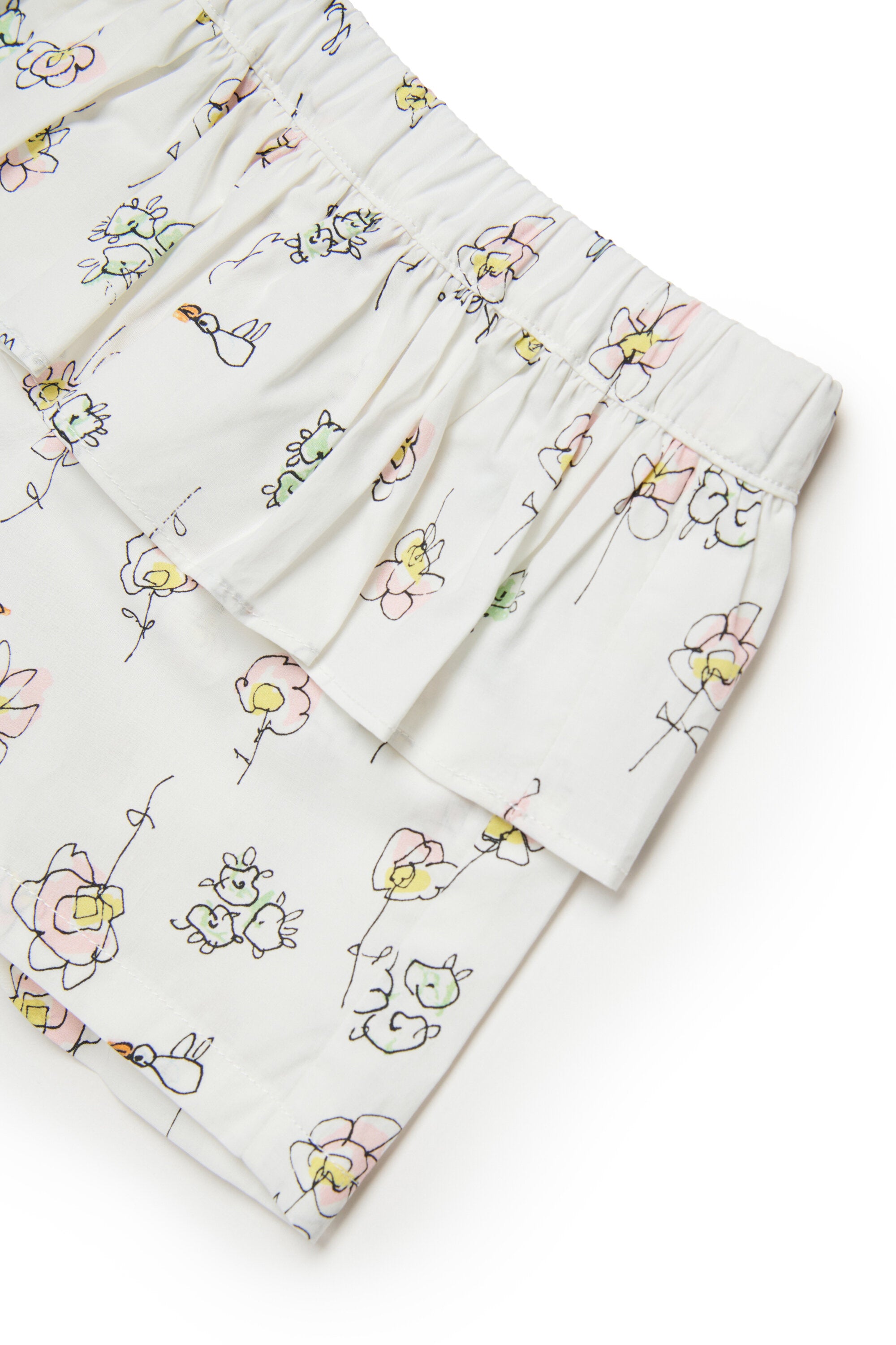 Shorts con volante y estampado de flores