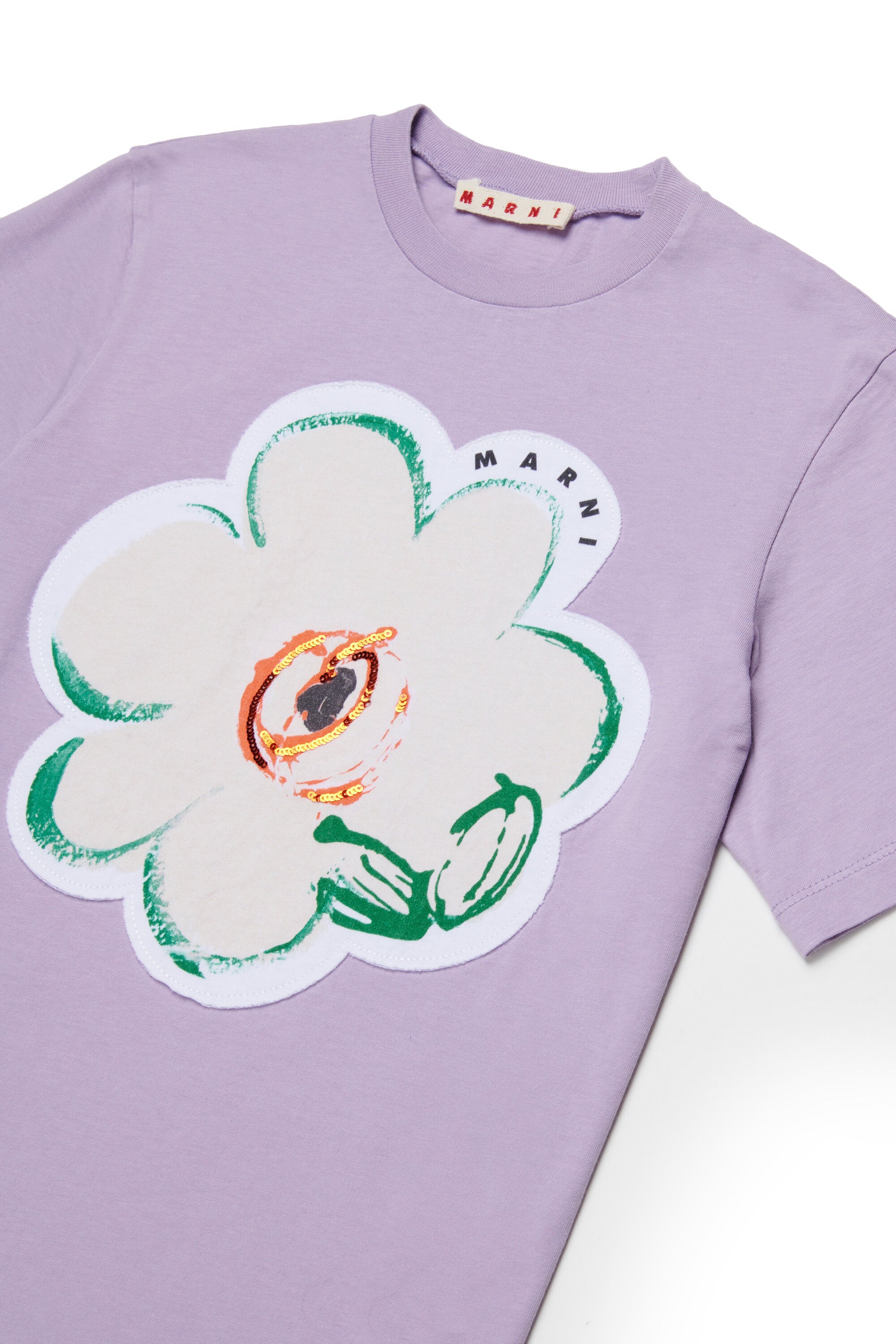 Camiseta con flor aplicada y logo