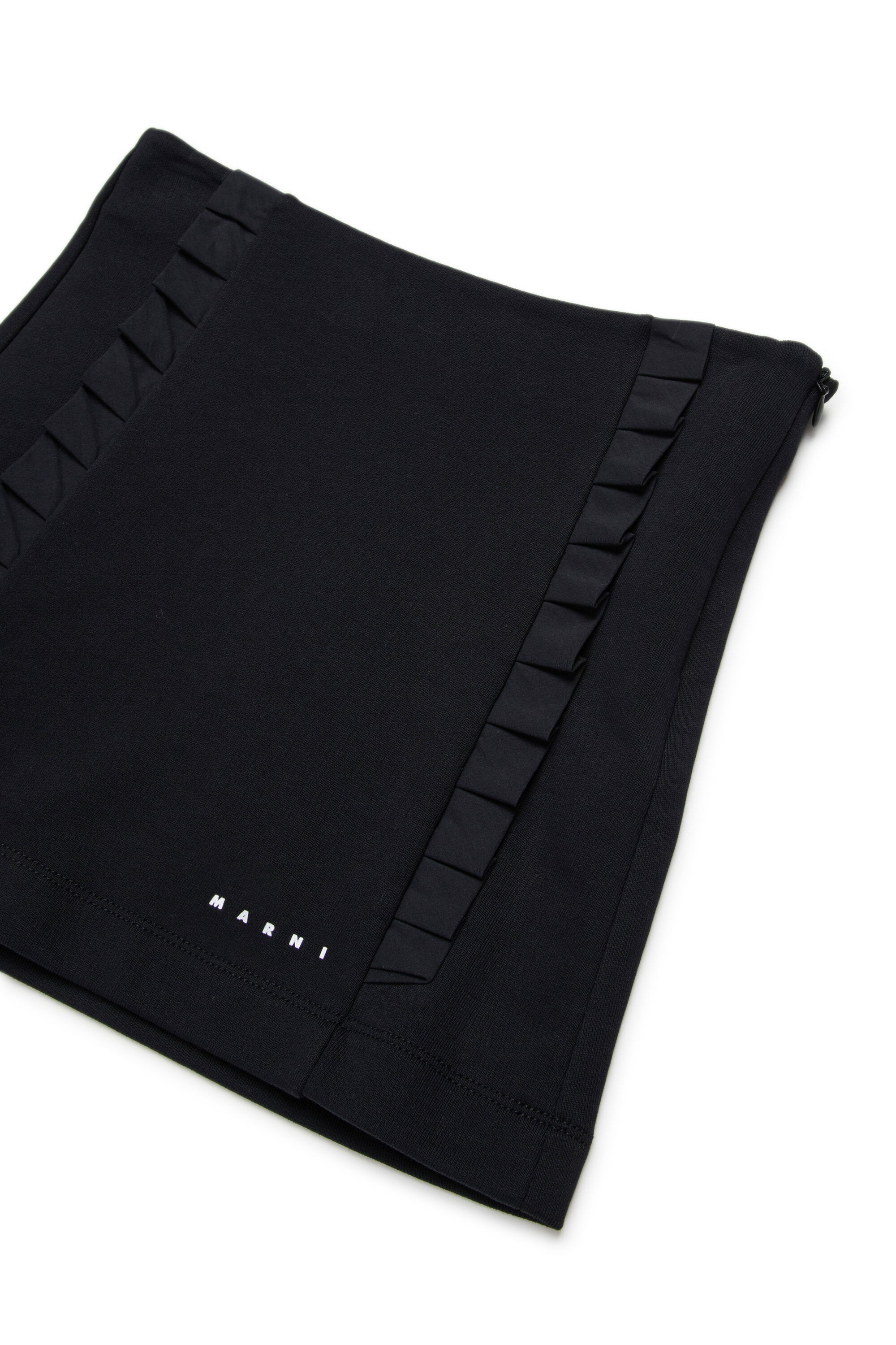 Minifalda con detalles plisados