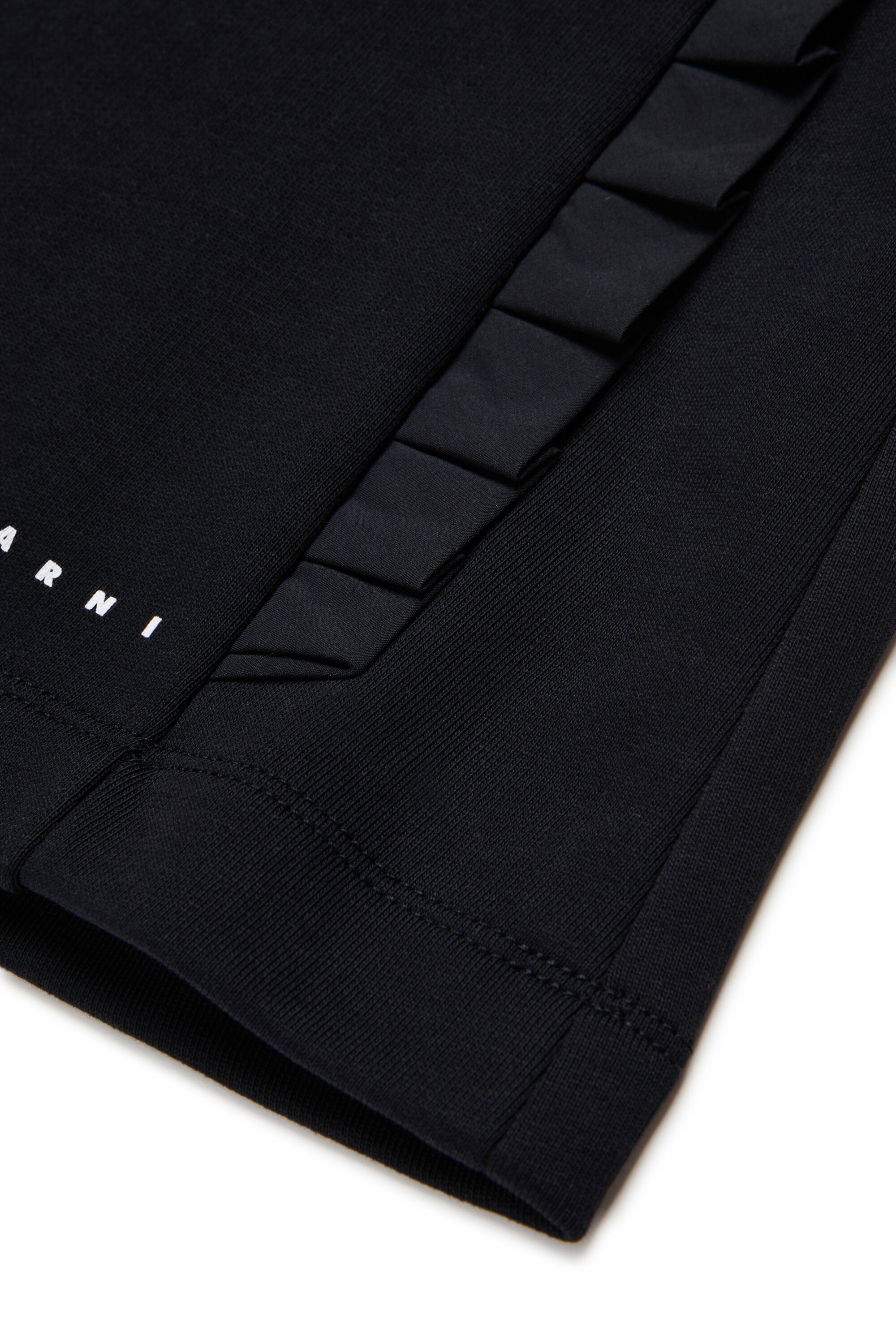 Minifalda con detalles plisados