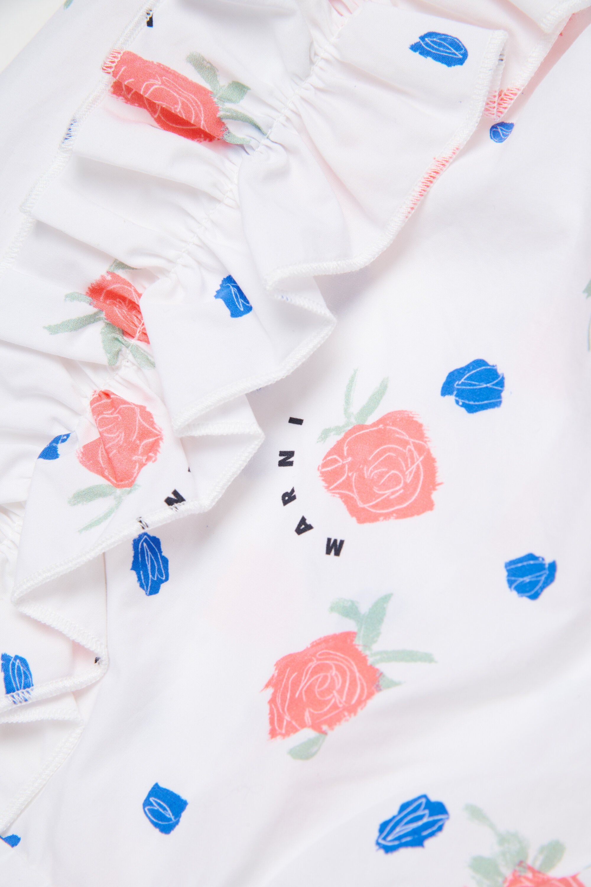 Dress with straps and floral print