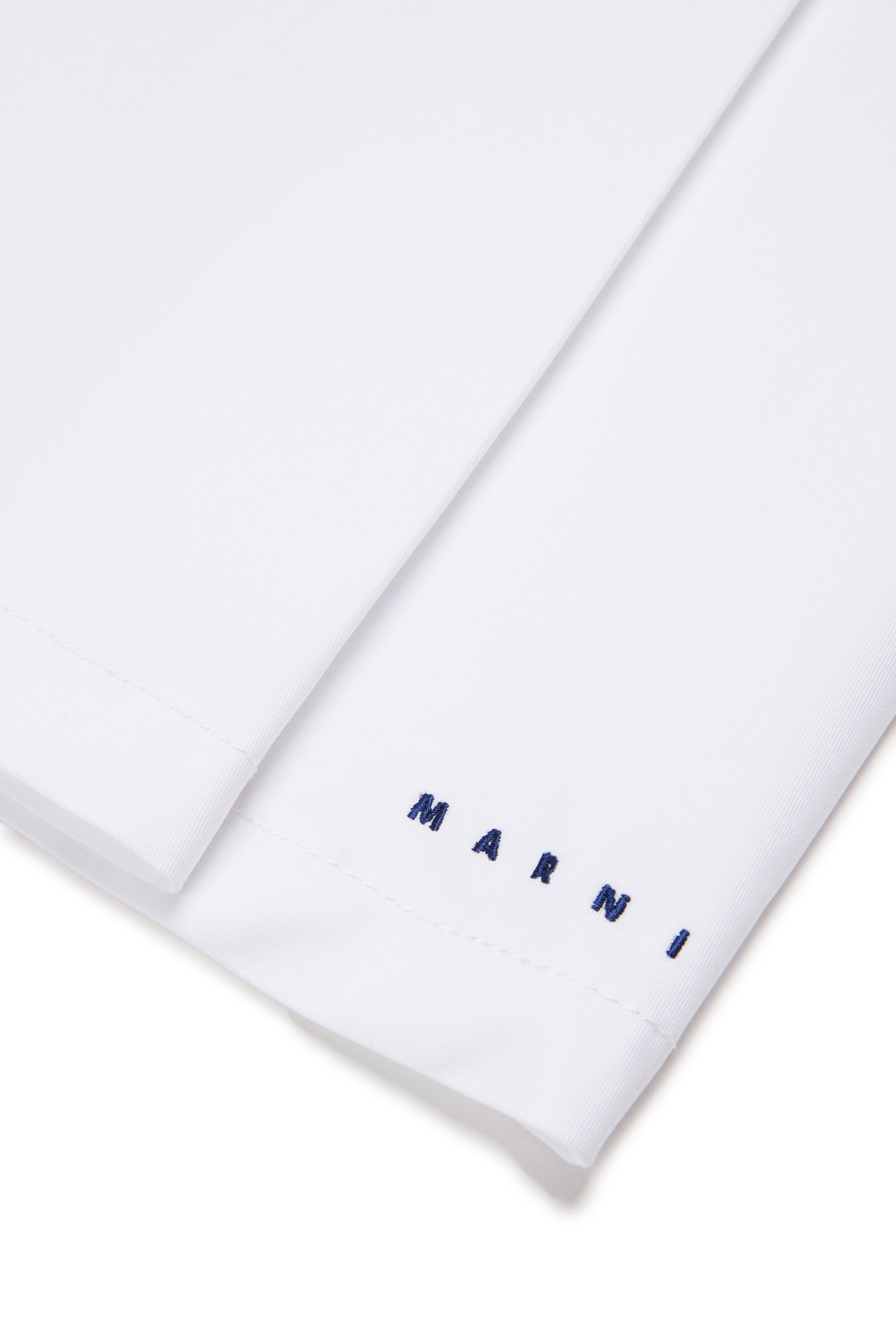 Falda plisada con logo