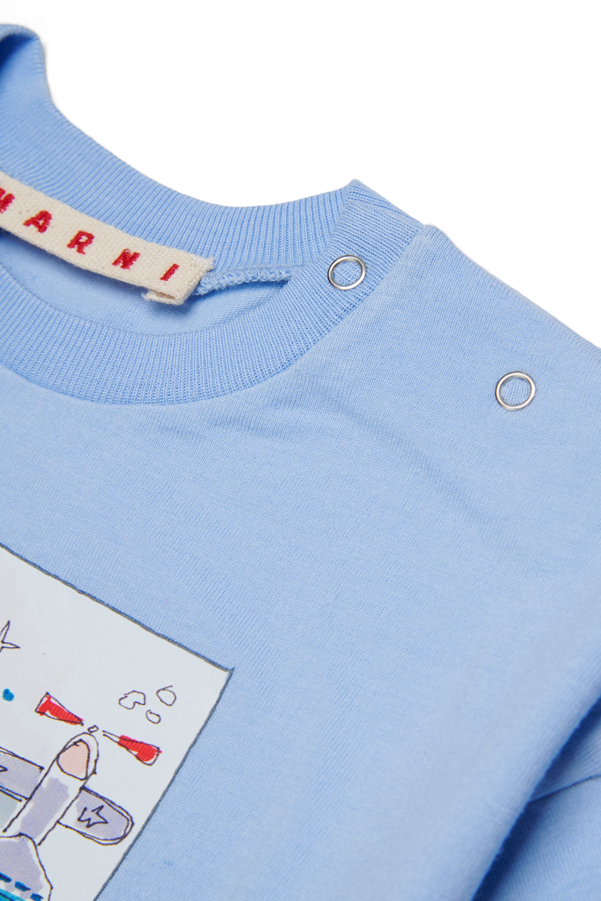 Camiseta con estampado de aviones y logo