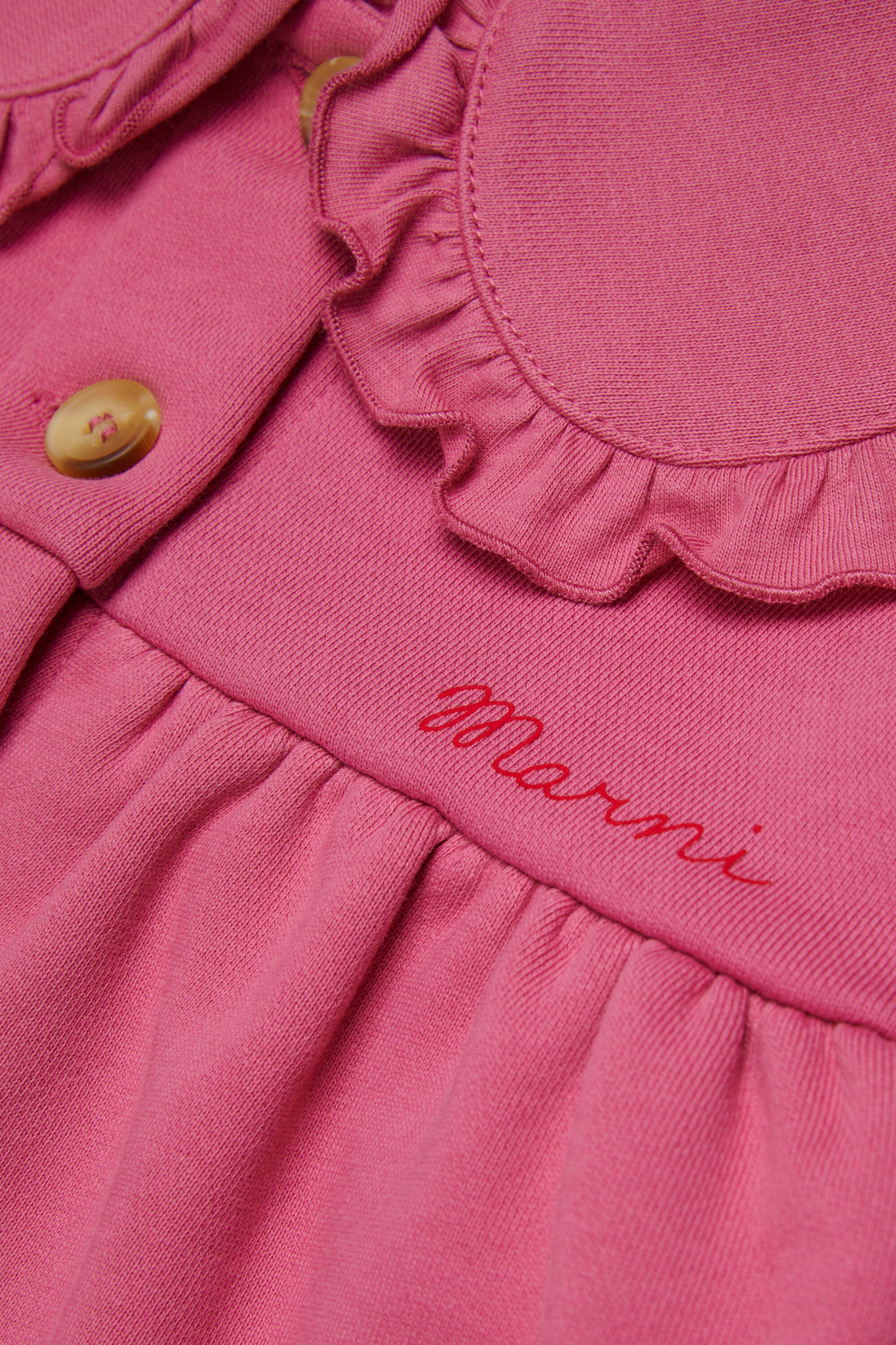 Chaqueta con logo y volantes