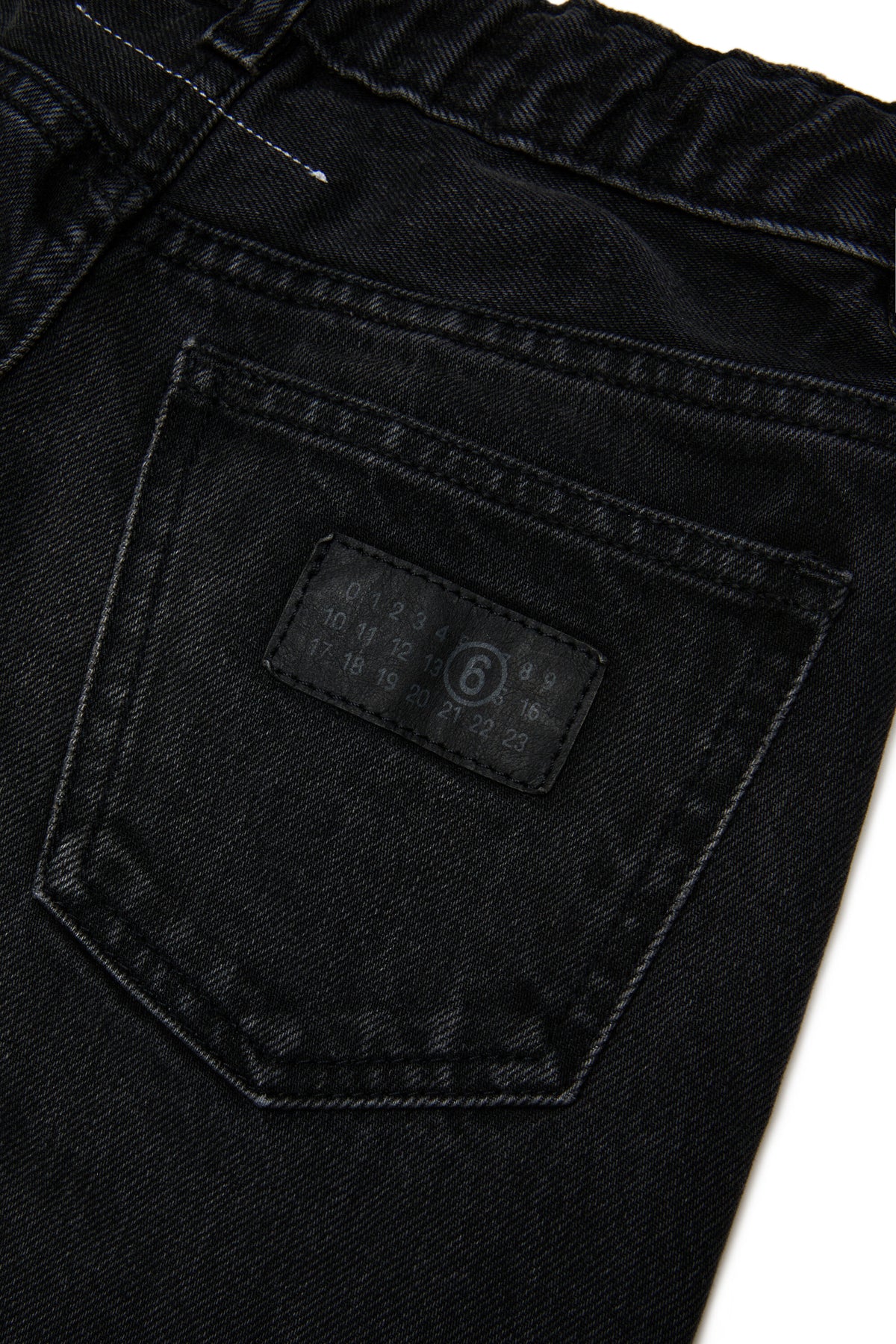 Jeans corte acampanado efecto usado