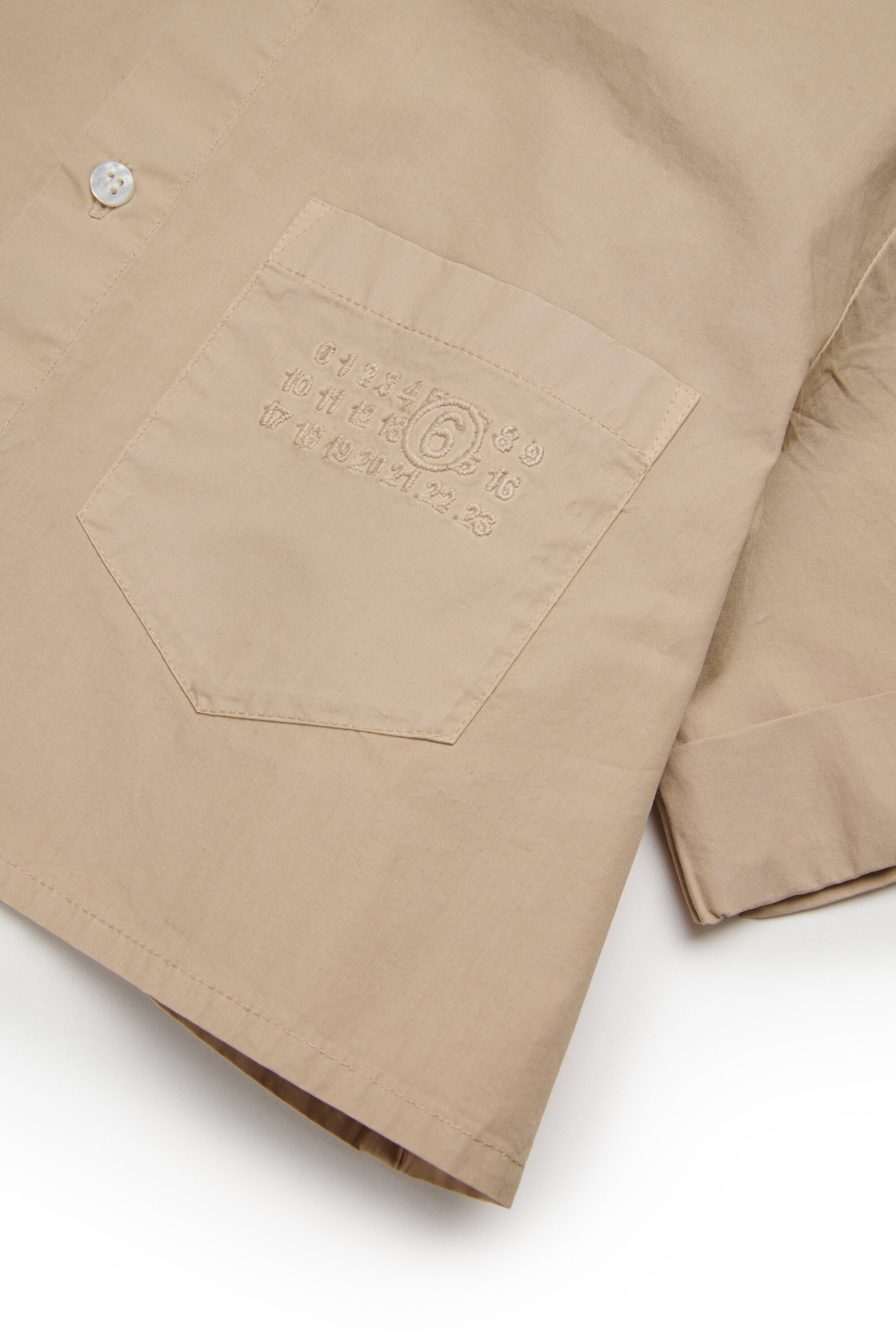 Camisa de popelín con mangas vueltas