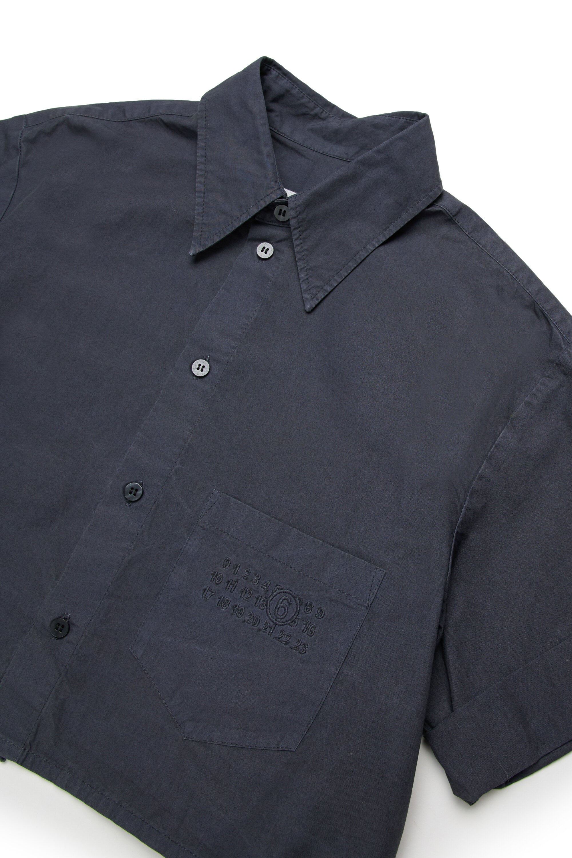 Camisa de popelín con mangas vueltas