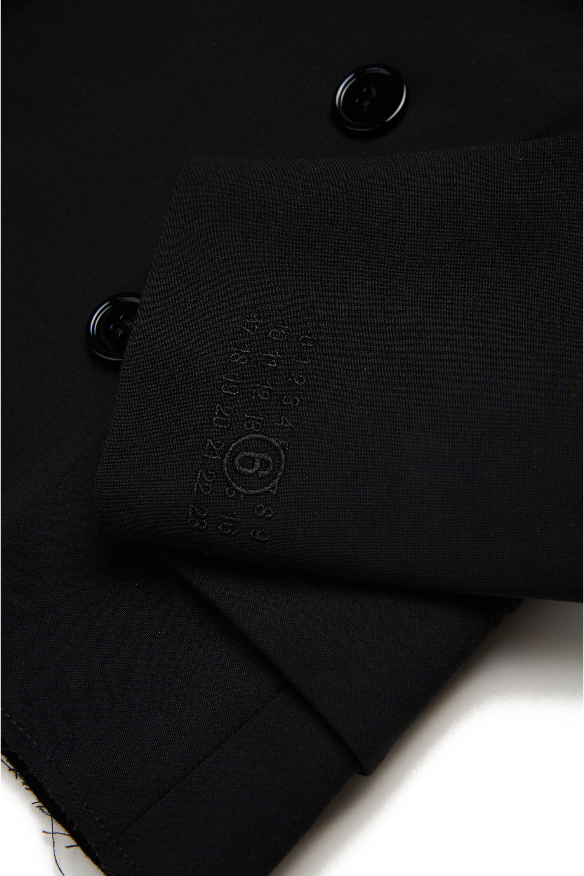 Chaqueta de lana fría con botonadura doble