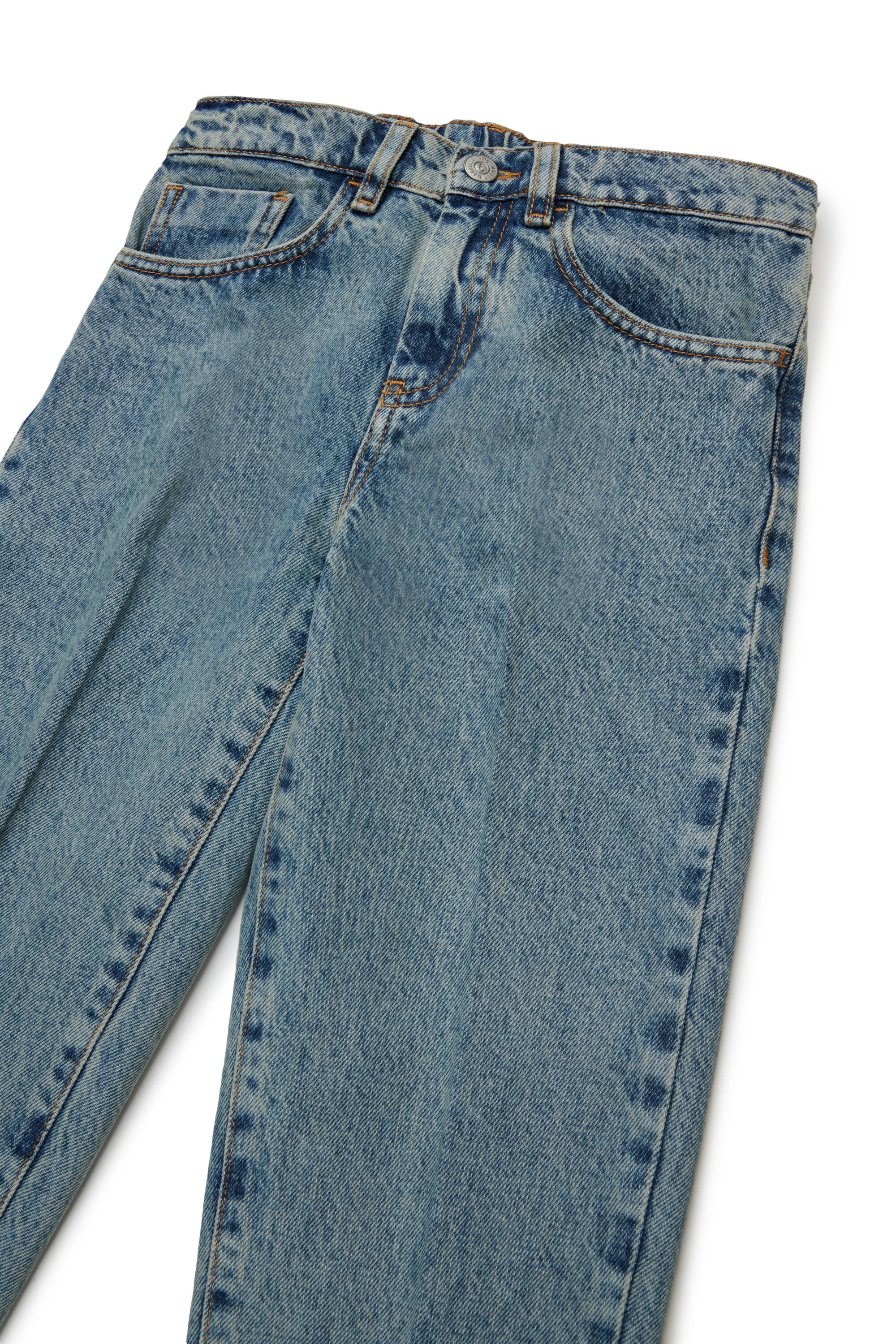 Medium blue slim jeans with stitched pleats