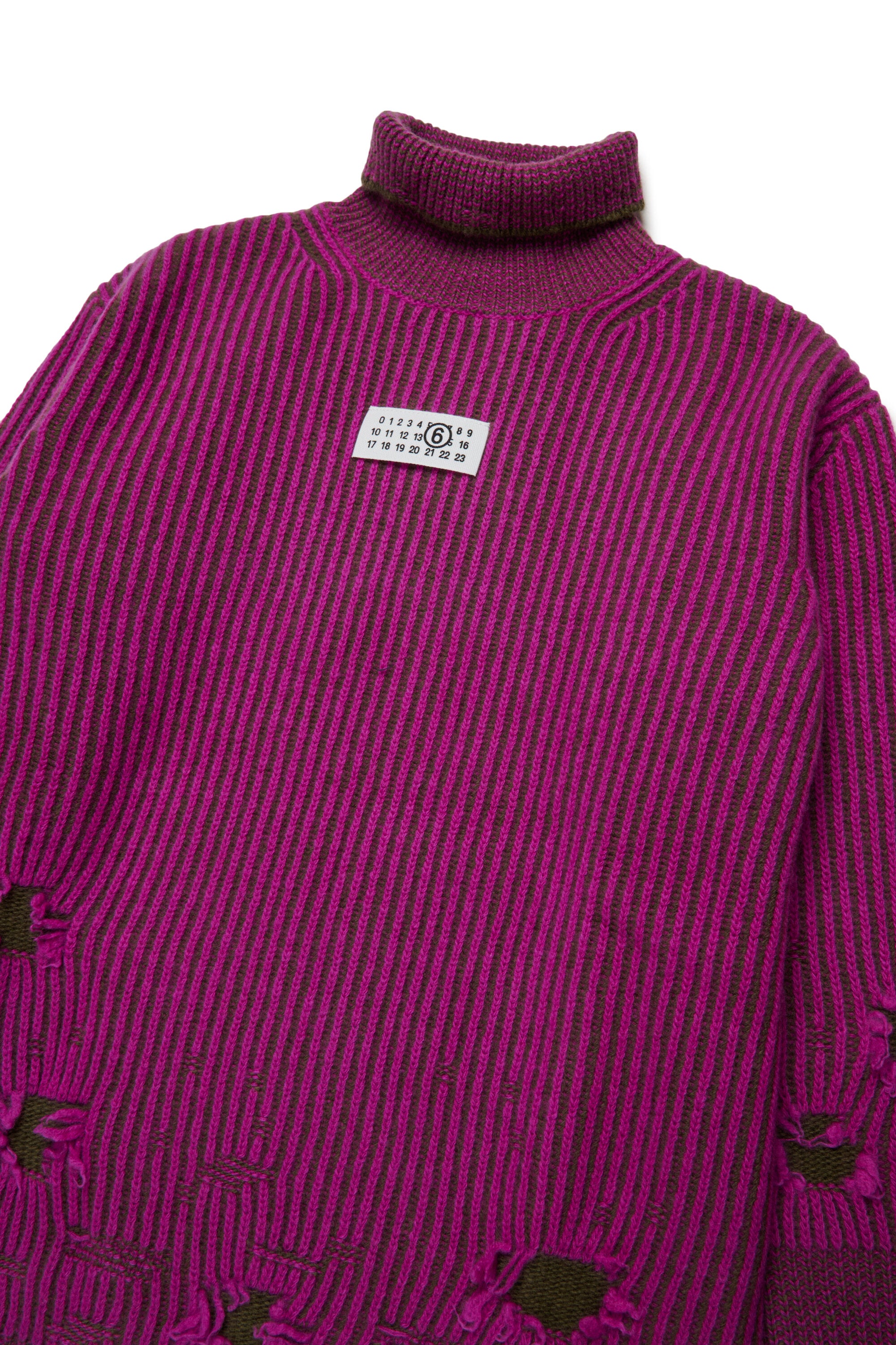 Ribbed wool mini dress with rips