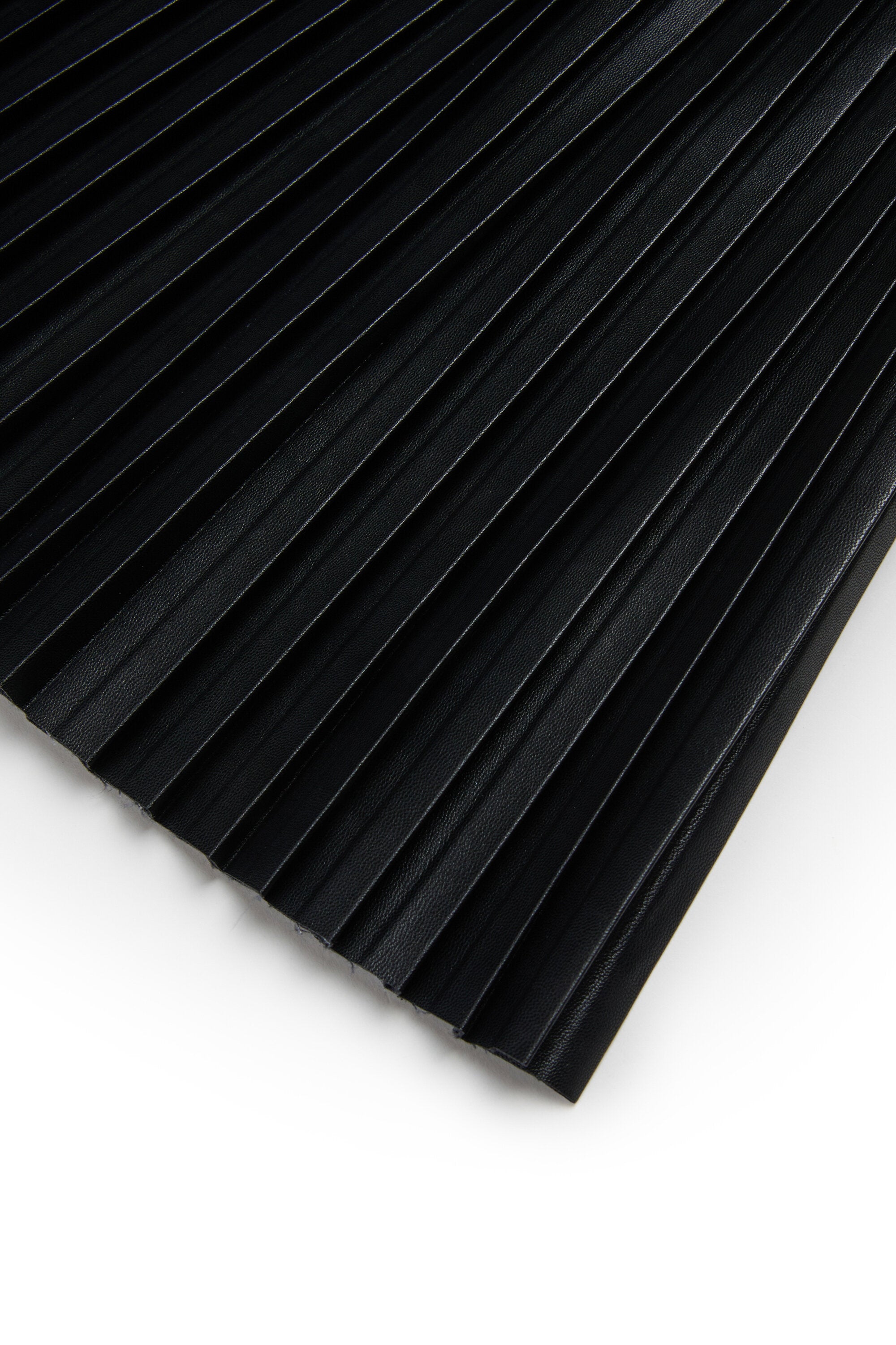 Falda corta de tejido recubierto