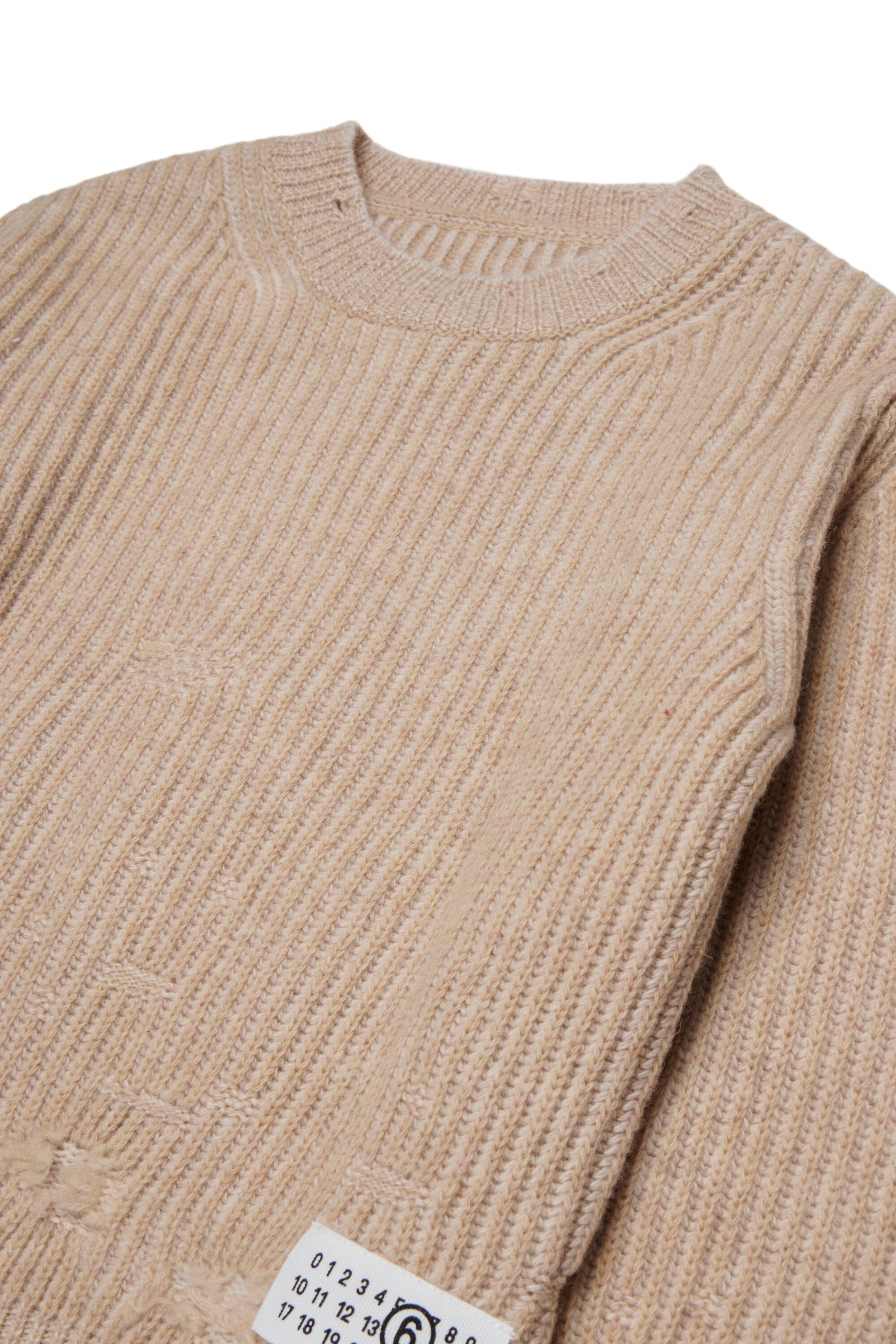 Jersey de lana canalé con rotos