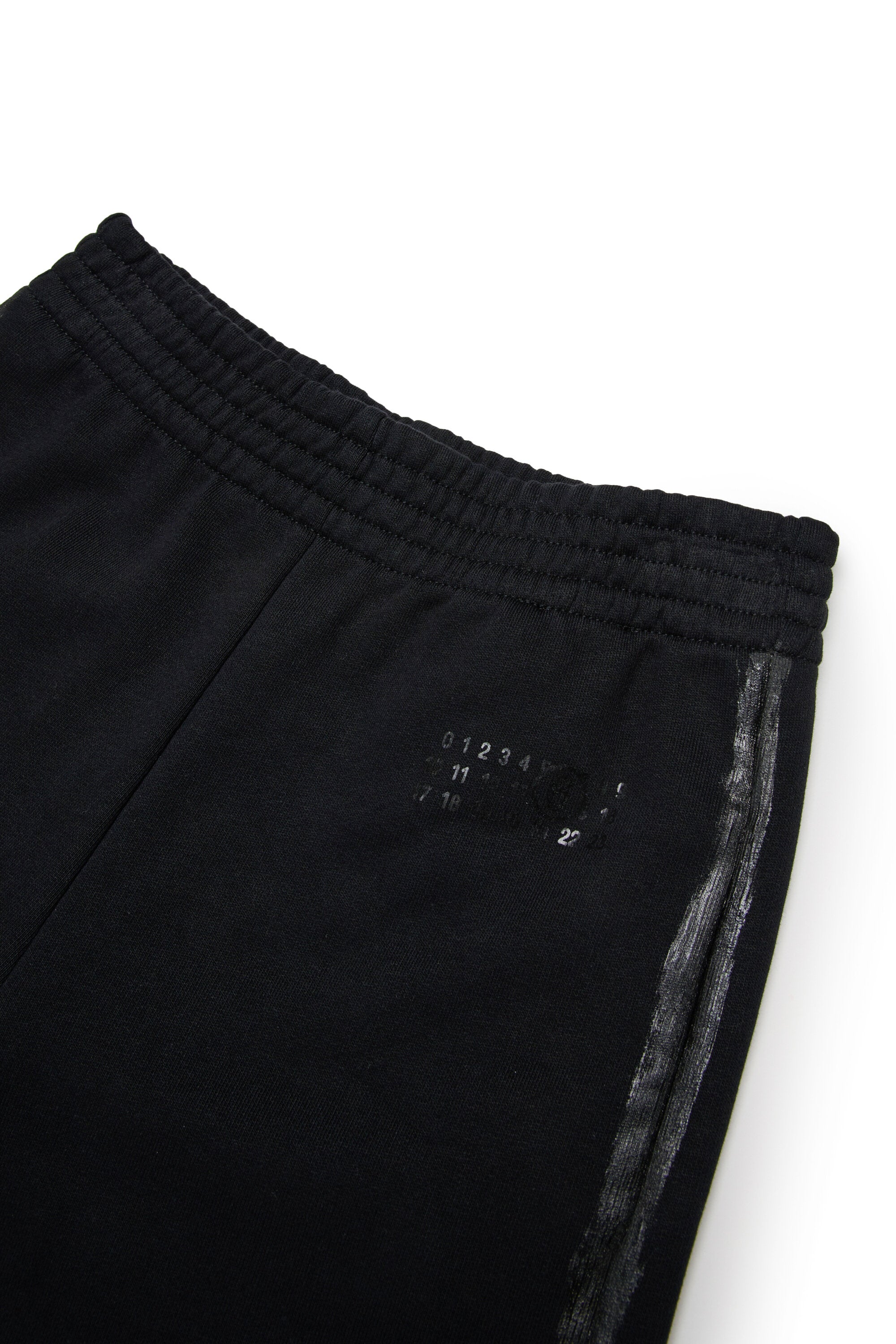 Pantalones sudadera con pinceladas brillantes