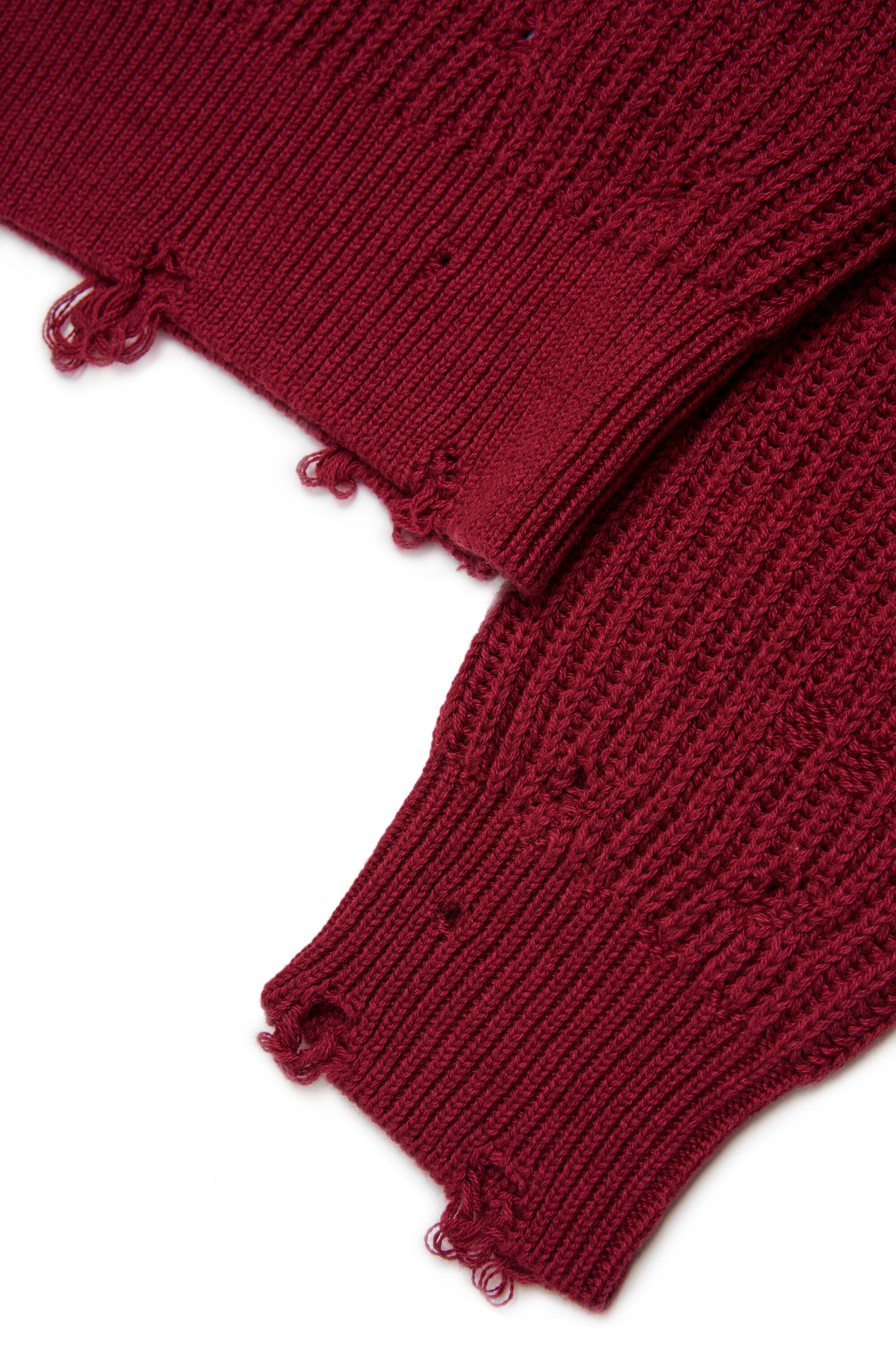 Jersey de cuello en V con detalles desgastados