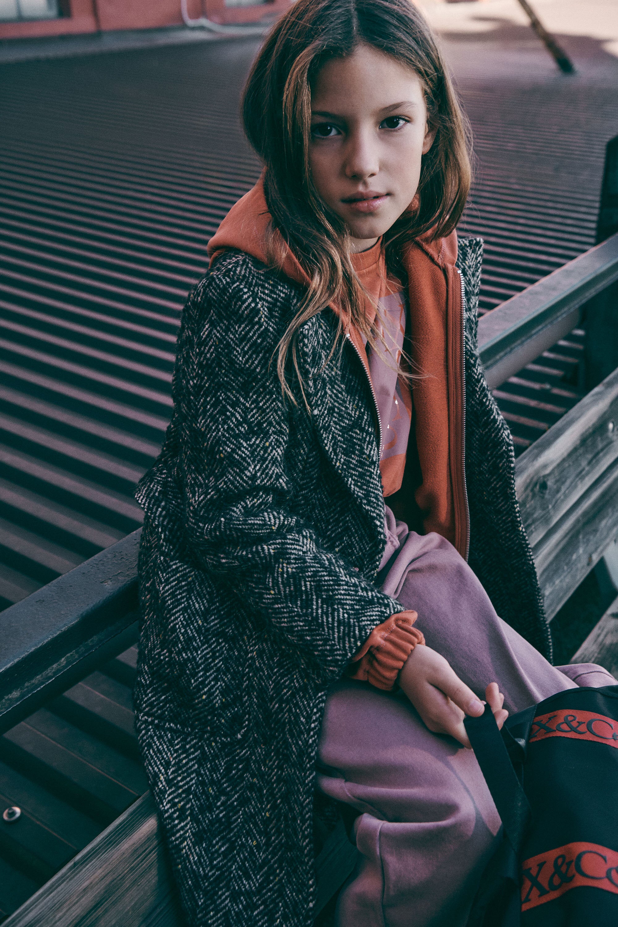 Coat with herringbone pattern