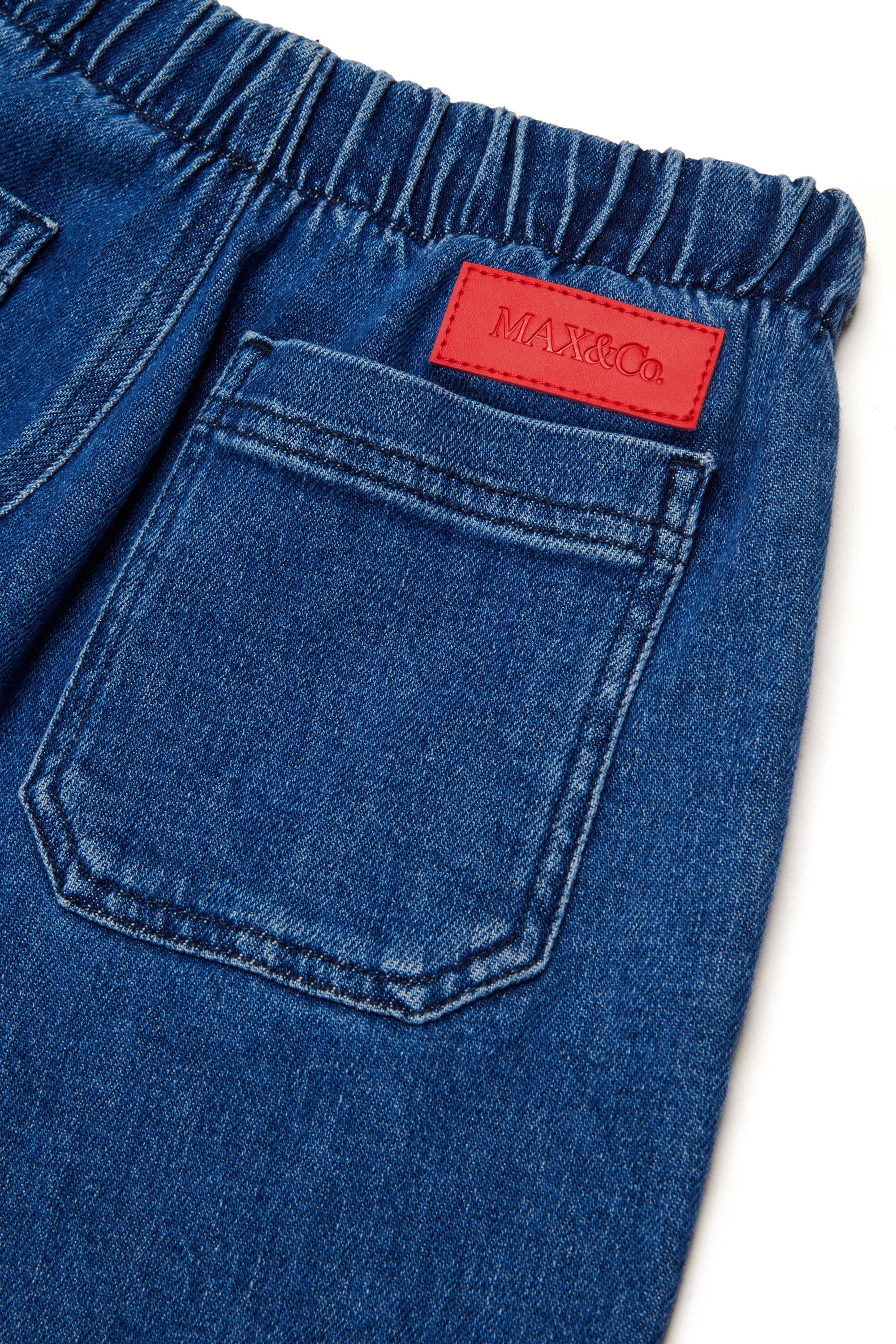 Jeans flare fit con cintura elástica en la cintura