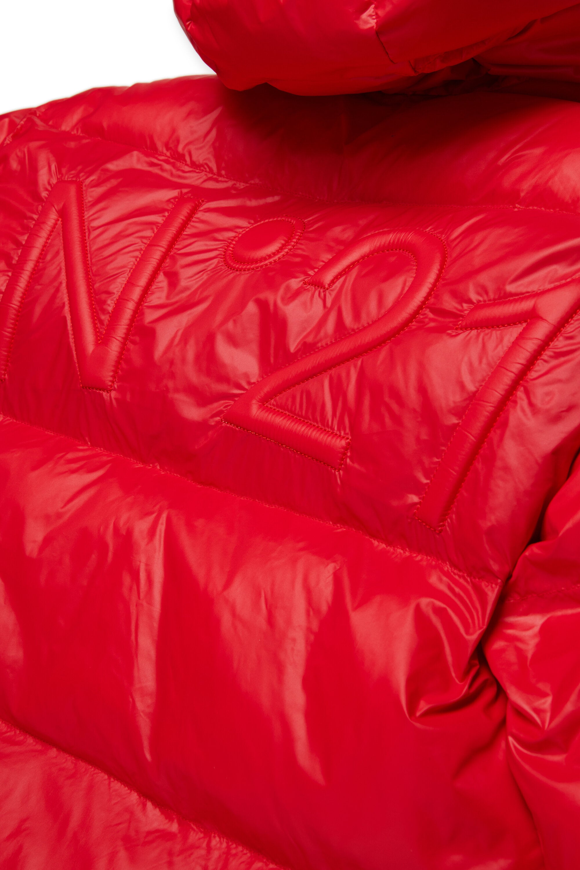 Chaqueta corta acolchada con dobladillo asimétrico