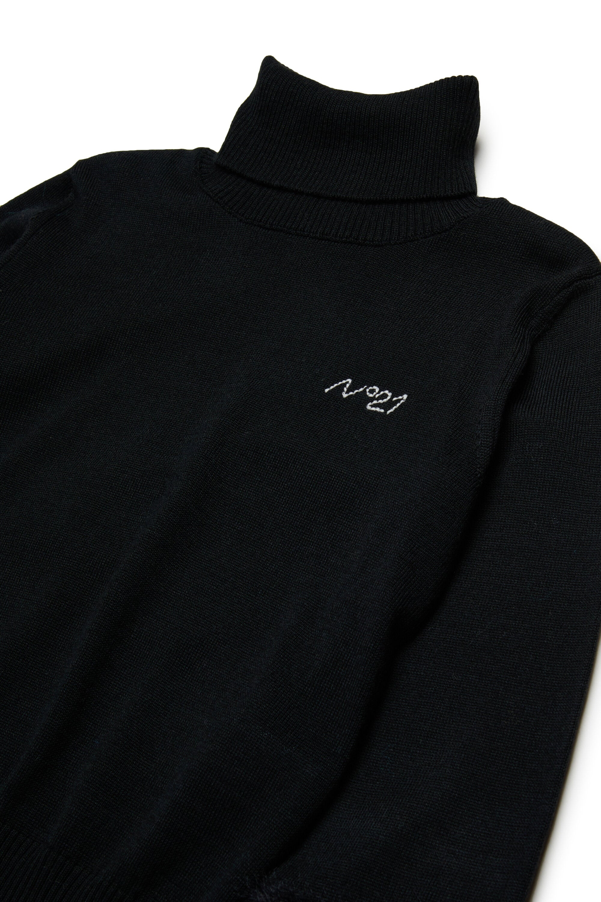 Cuello alto en mezcla de lana con piel sintética en las mangas