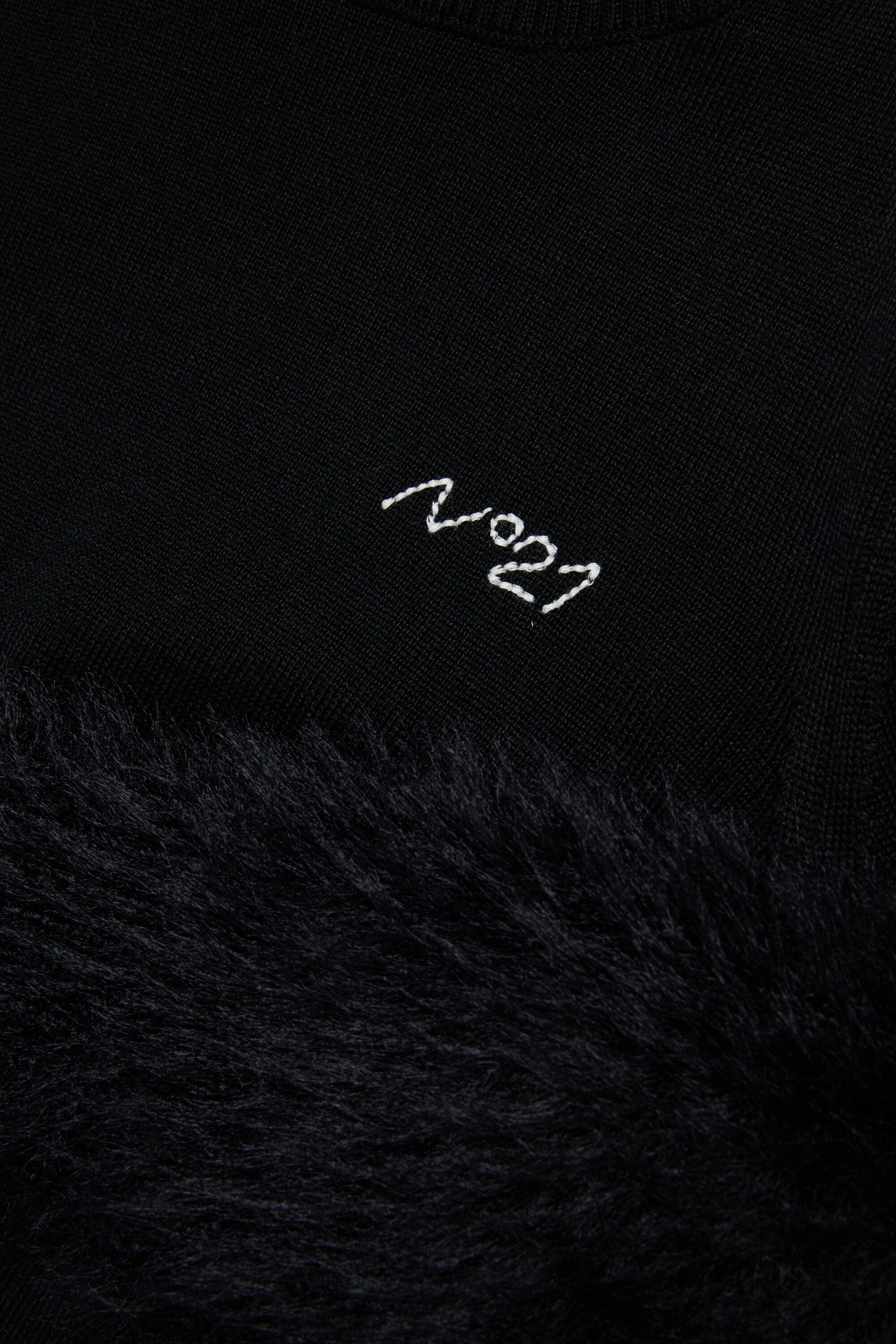 Wool-blend turtleneck with faux fur on sleeves