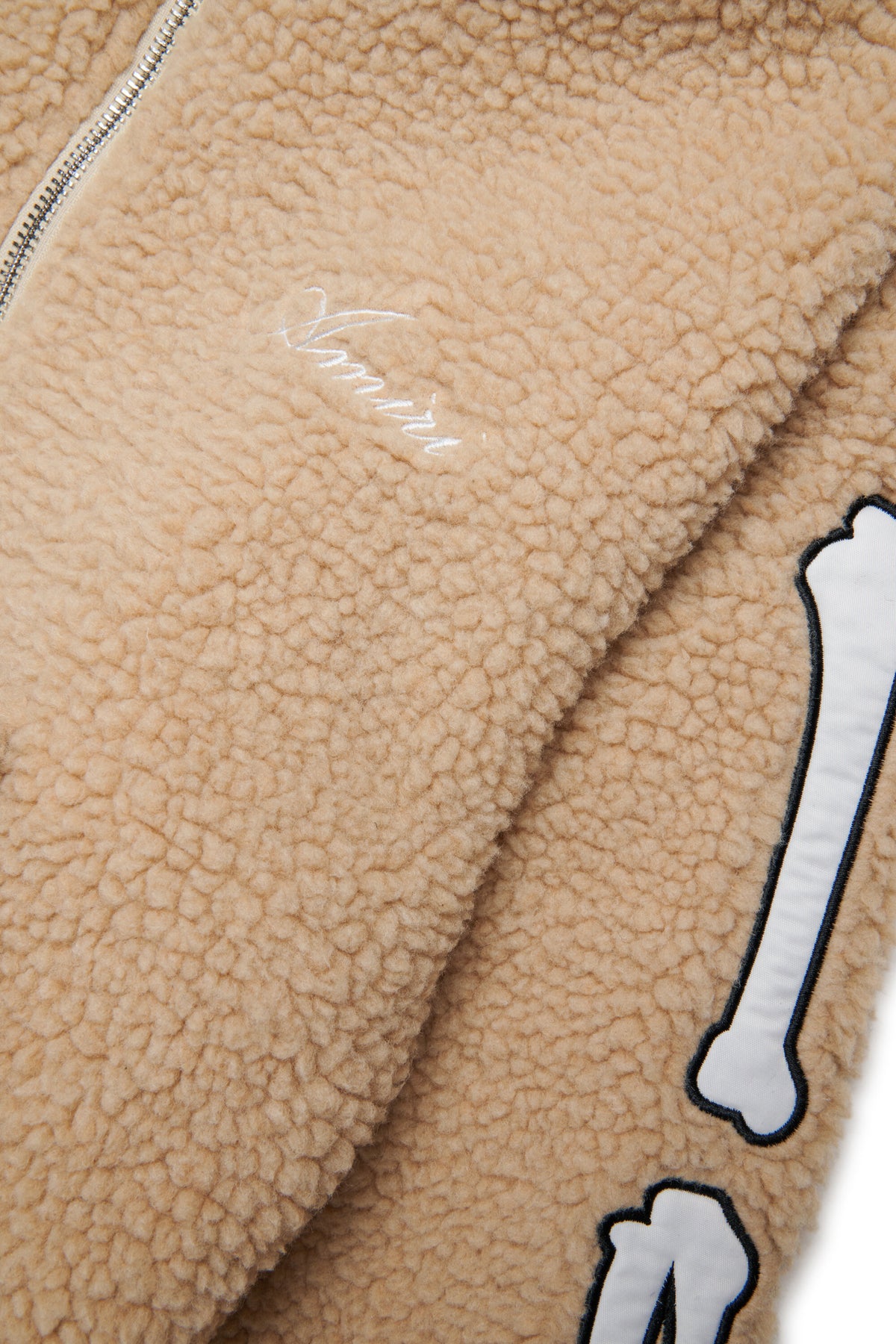 Chaqueta teddy con detalles de huesos